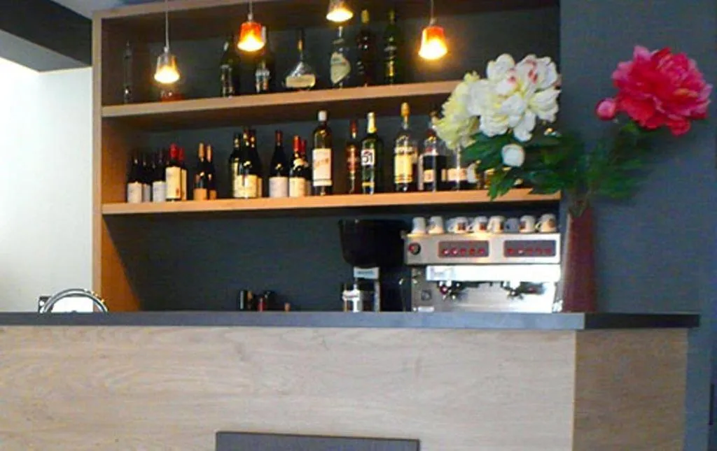 Lounge or bar in Hôtel de la Louée