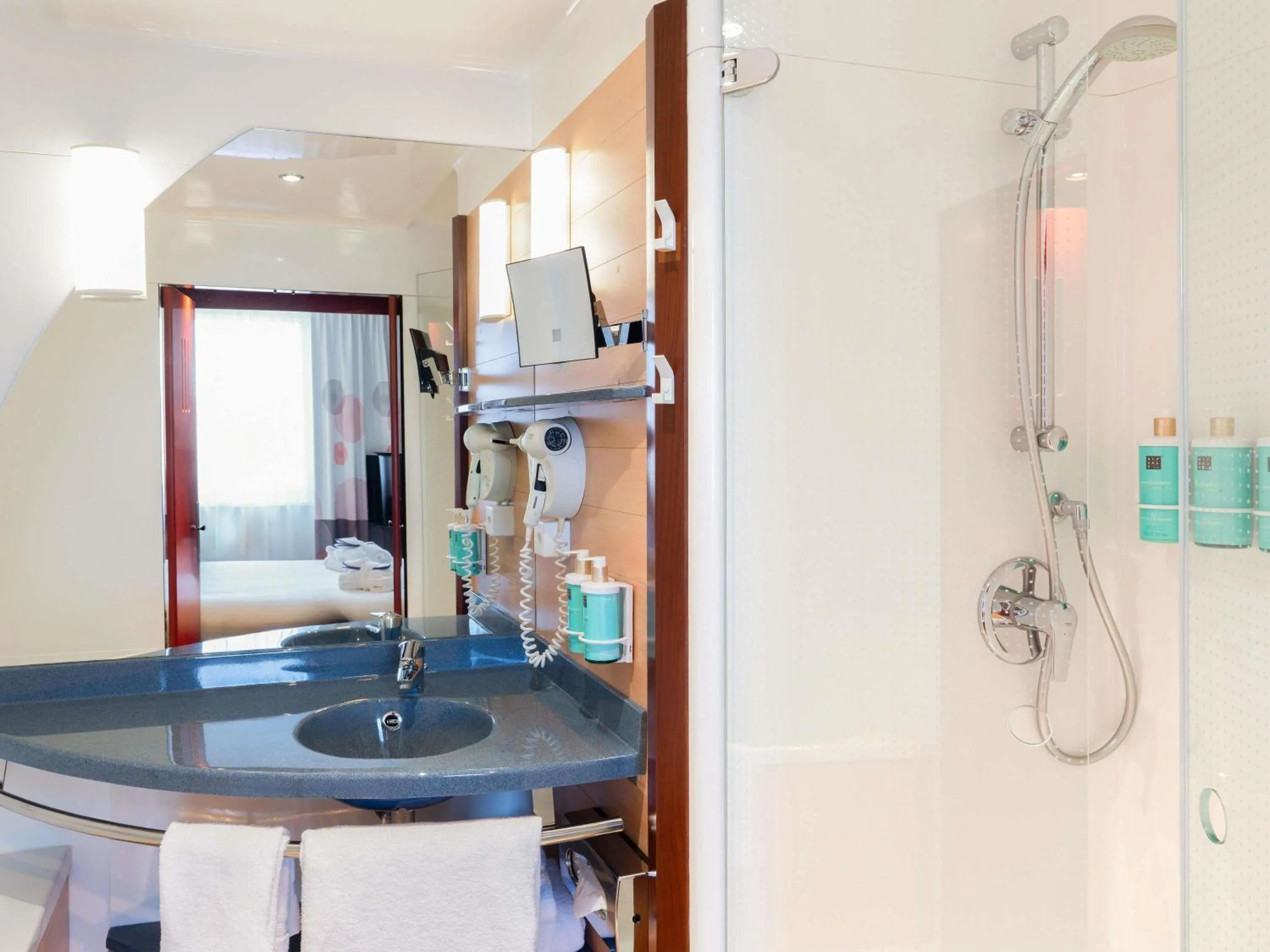 Bedroom in Novotel Suites Genève Aéroport