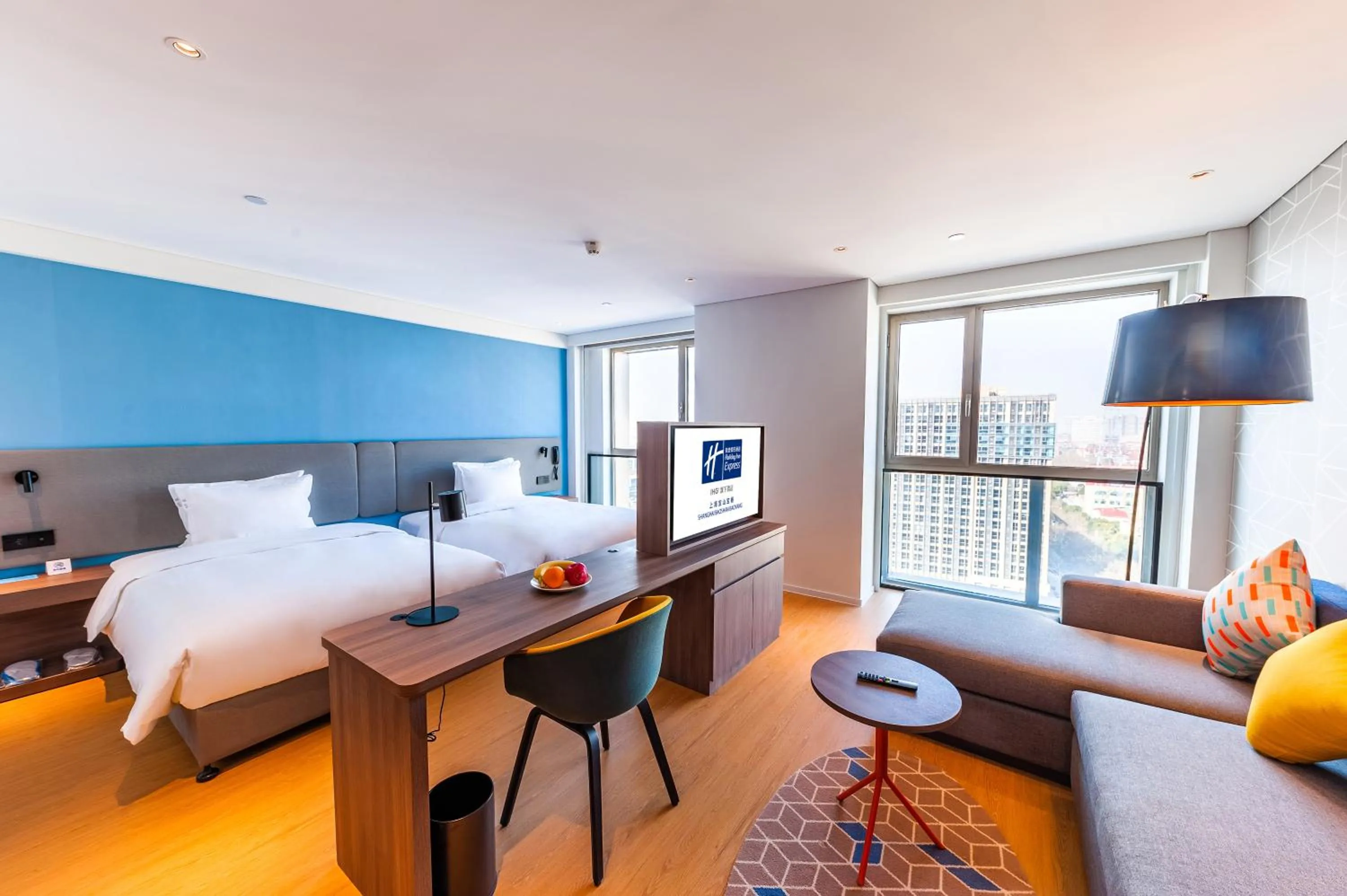 Bed in Holiday Inn Express Shanghai Baoyang by IHG