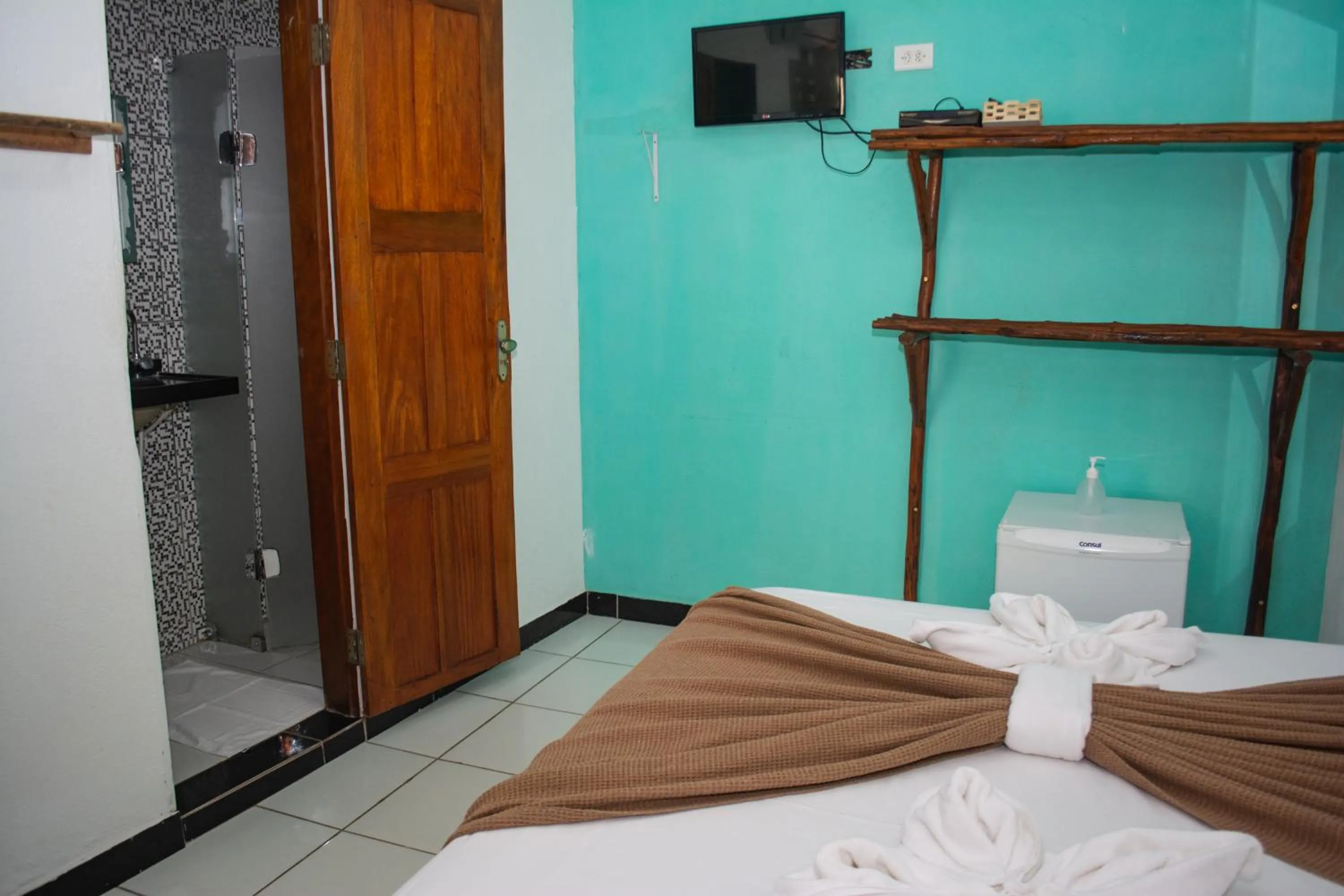 Bed in Pousada Numei de Jeri