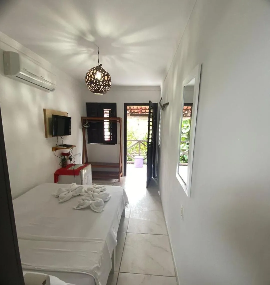 Bed in Pousada Numei de Jeri