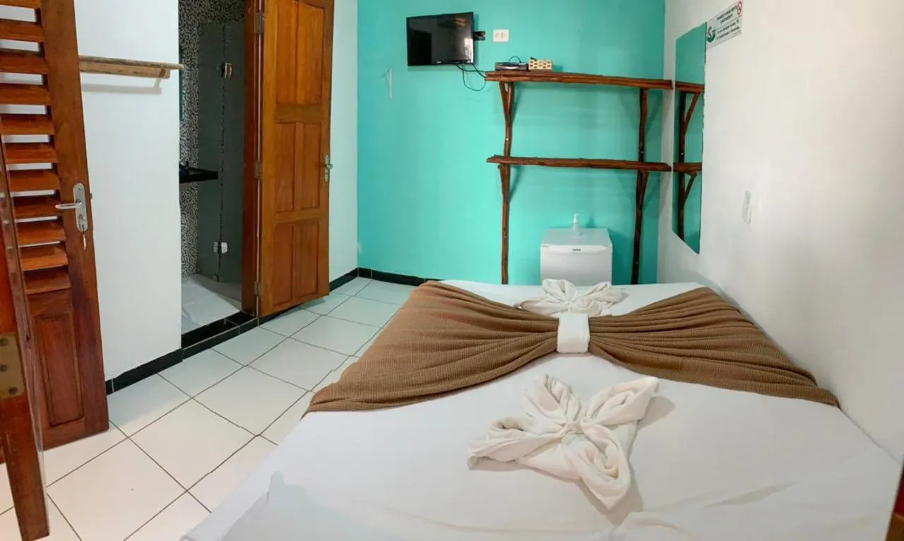 Bed in Pousada Numei de Jeri