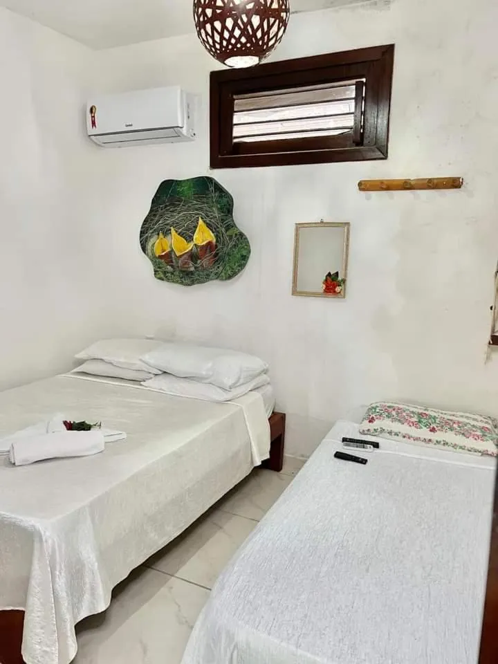 Bed in Pousada Numei de Jeri