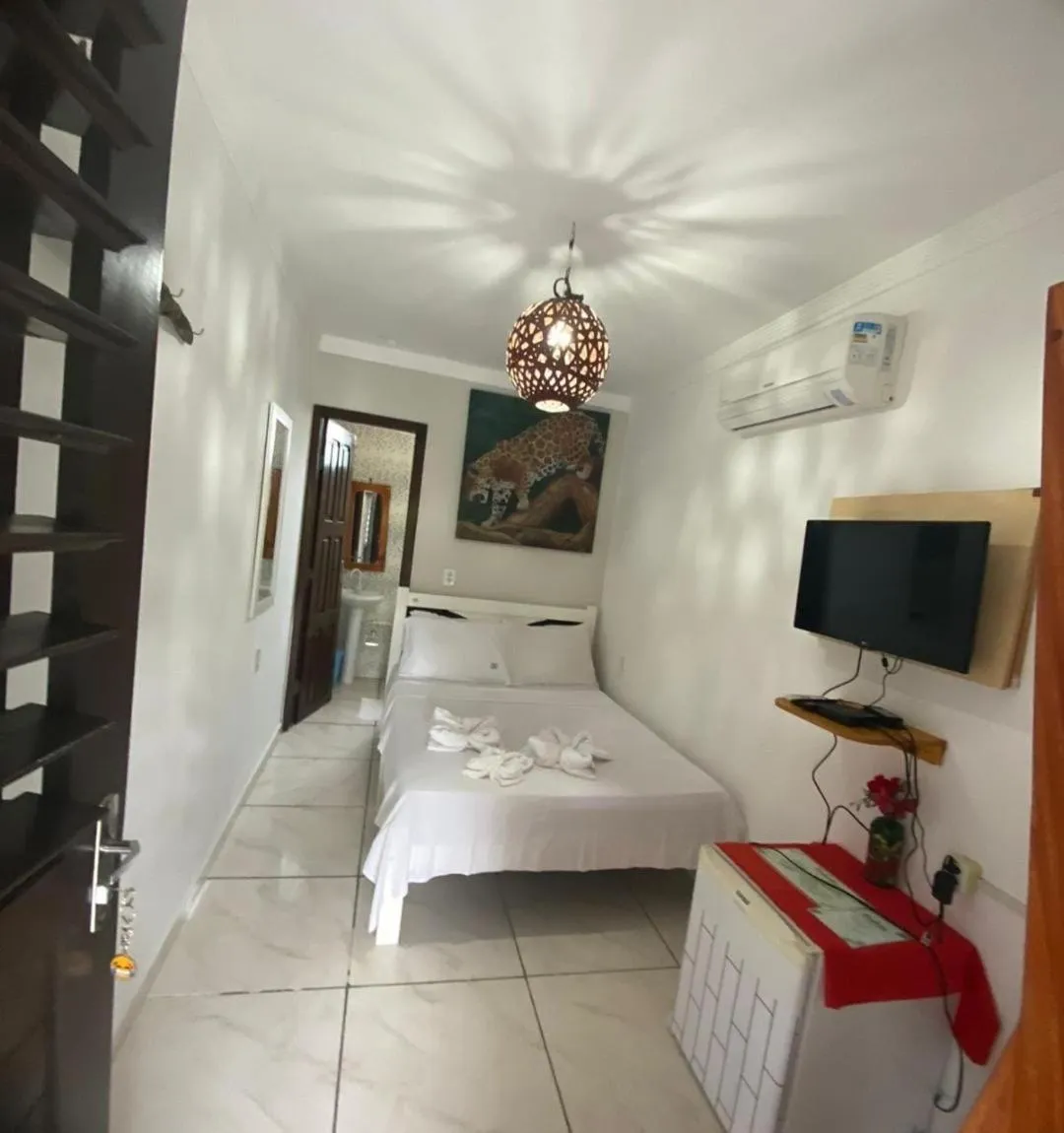 Bed in Pousada Numei de Jeri