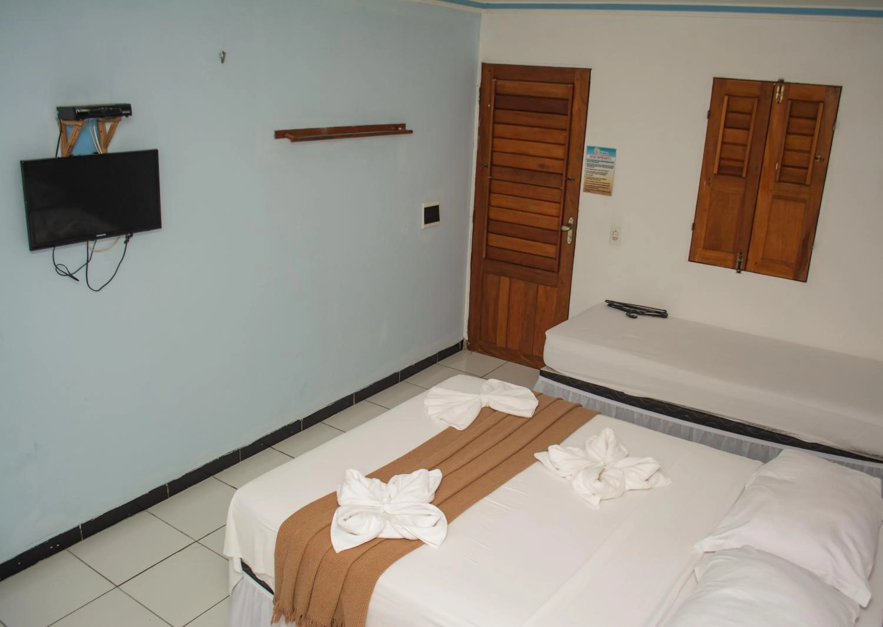 Bed in Pousada Numei de Jeri