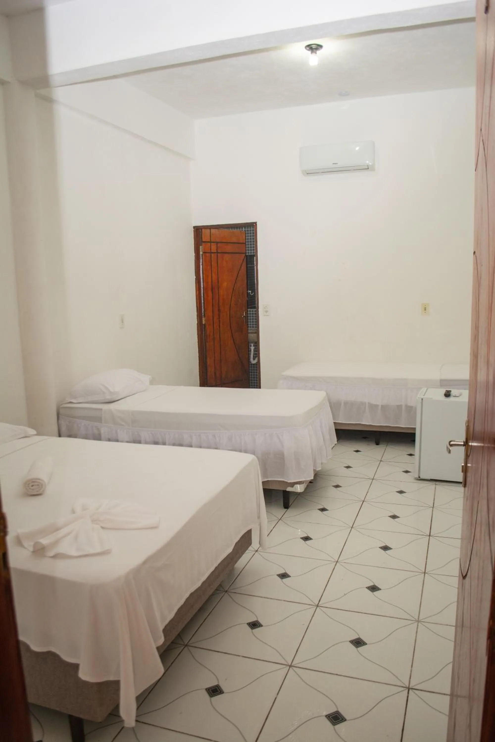 Bed in Pousada Numei de Jeri