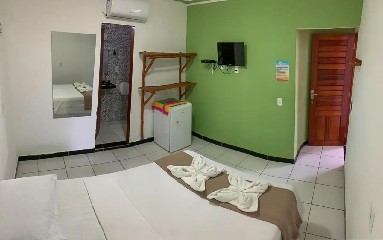 Bed in Pousada Numei de Jeri