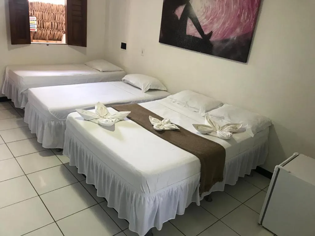 Bed in Pousada Numei de Jeri