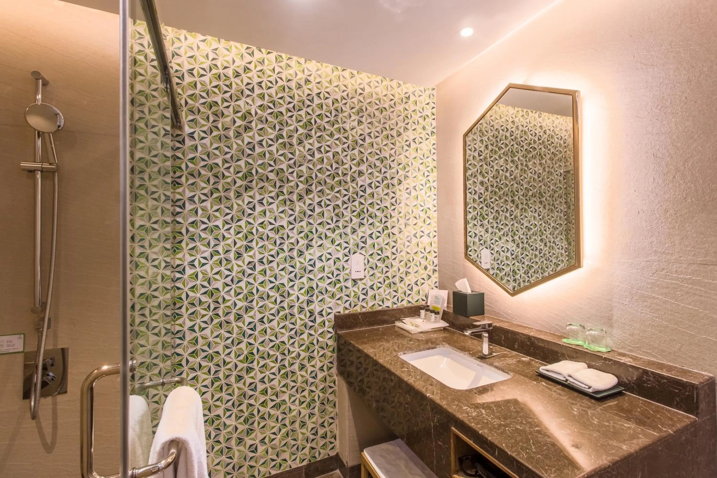 Bathroom in Holiday Inn Chandigarh Zirakpur by IHG