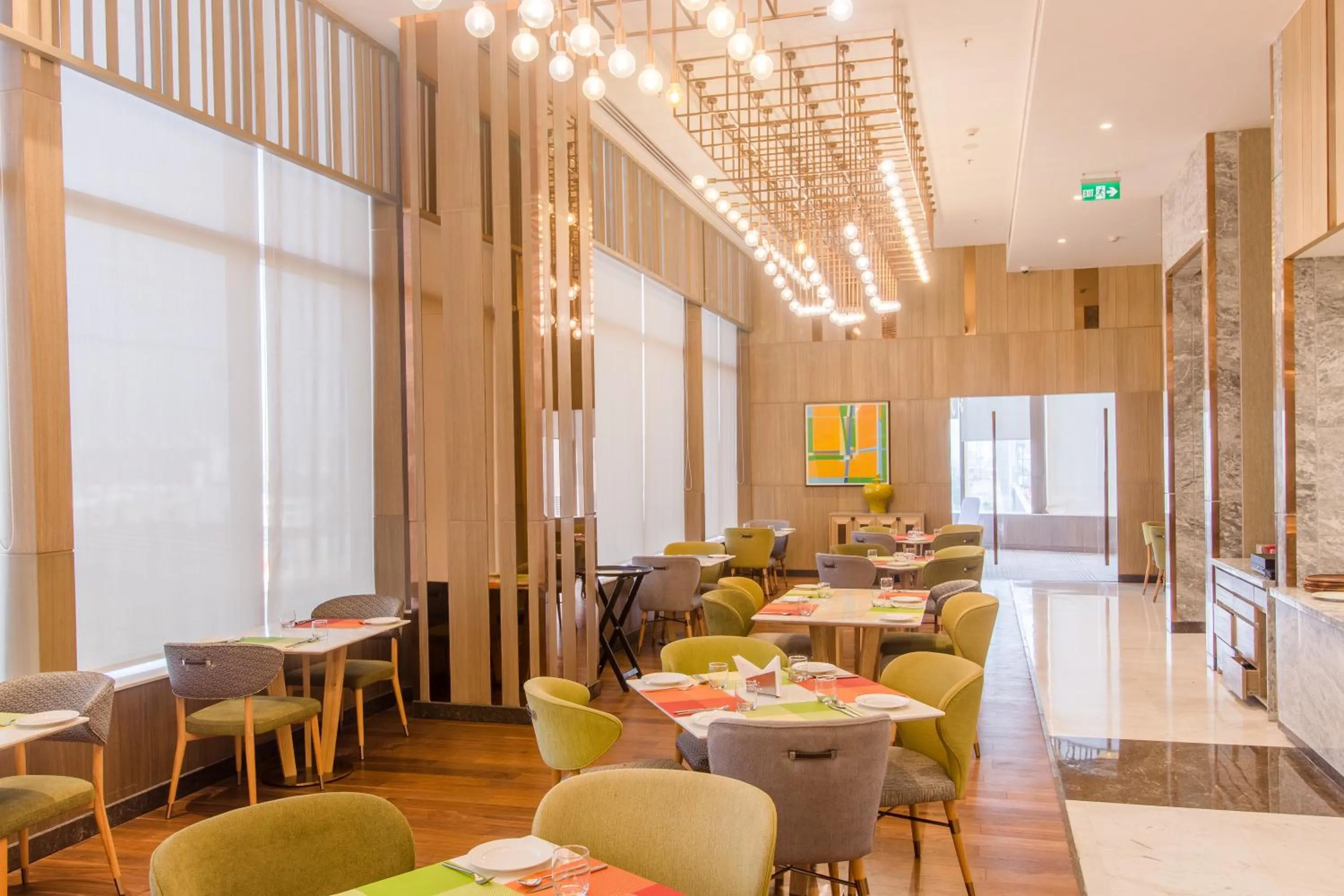 Dining area in Holiday Inn Chandigarh Zirakpur by IHG