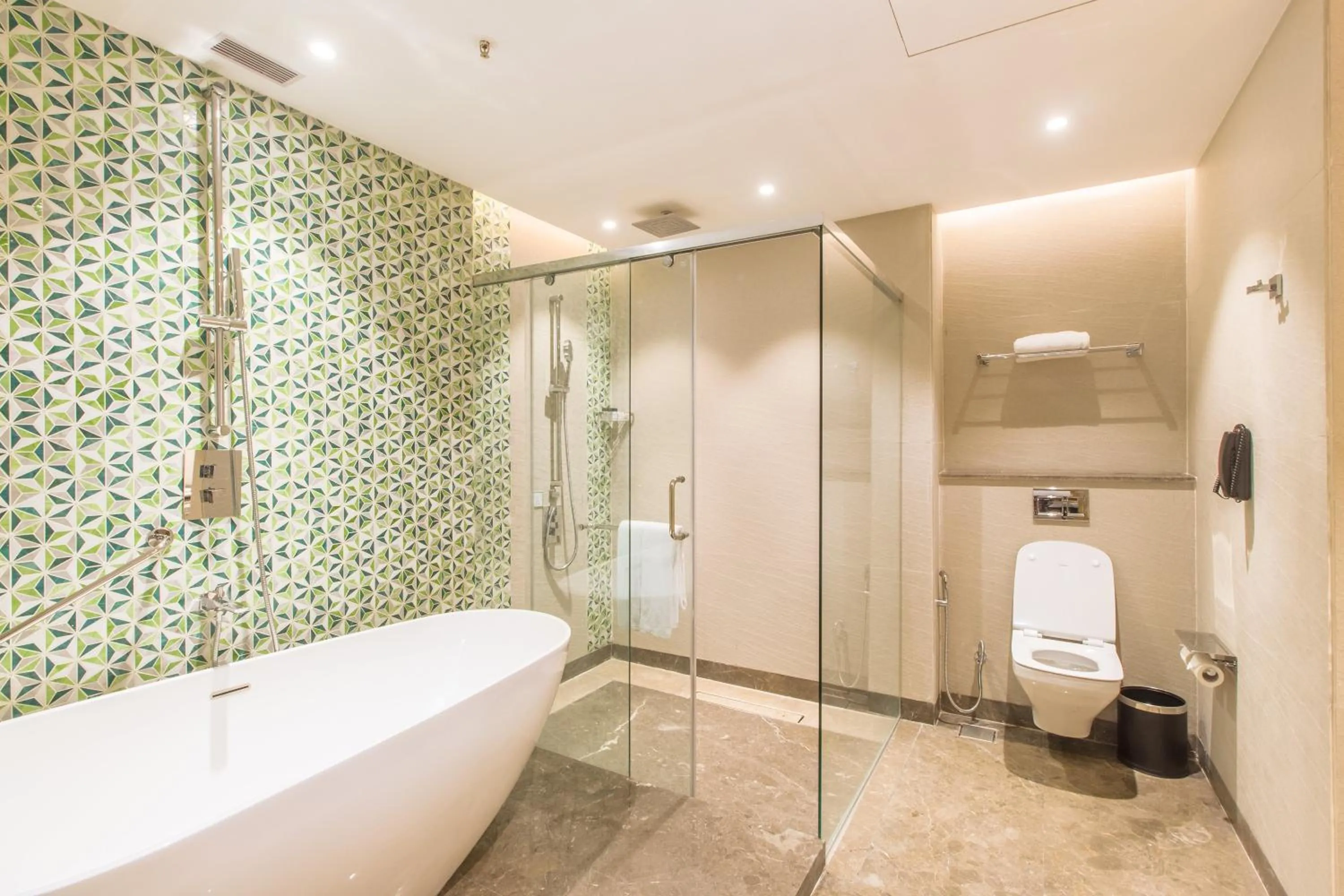 Bathroom in Holiday Inn Chandigarh Zirakpur by IHG