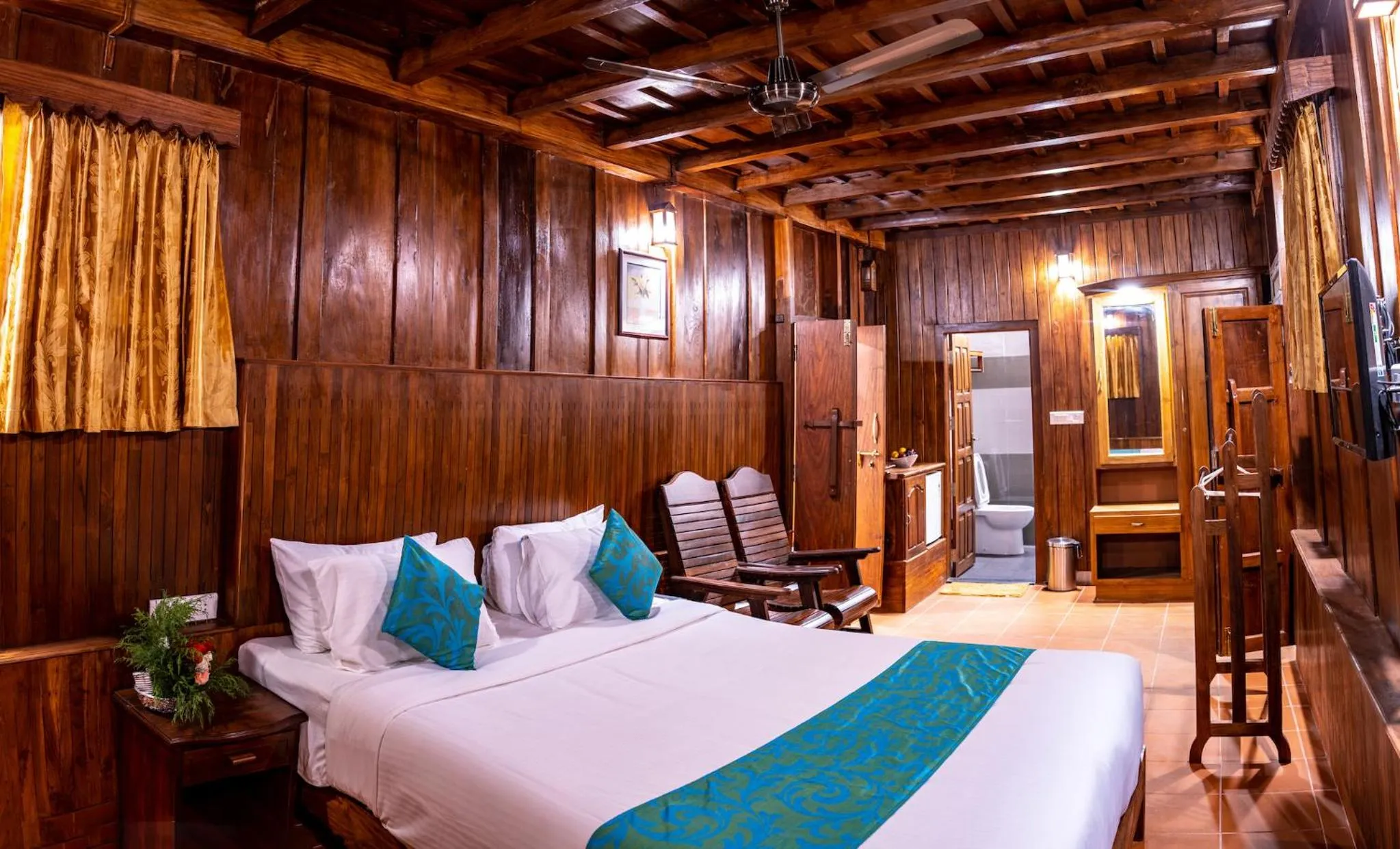 Bed in Kalpavanam Heritage Resort