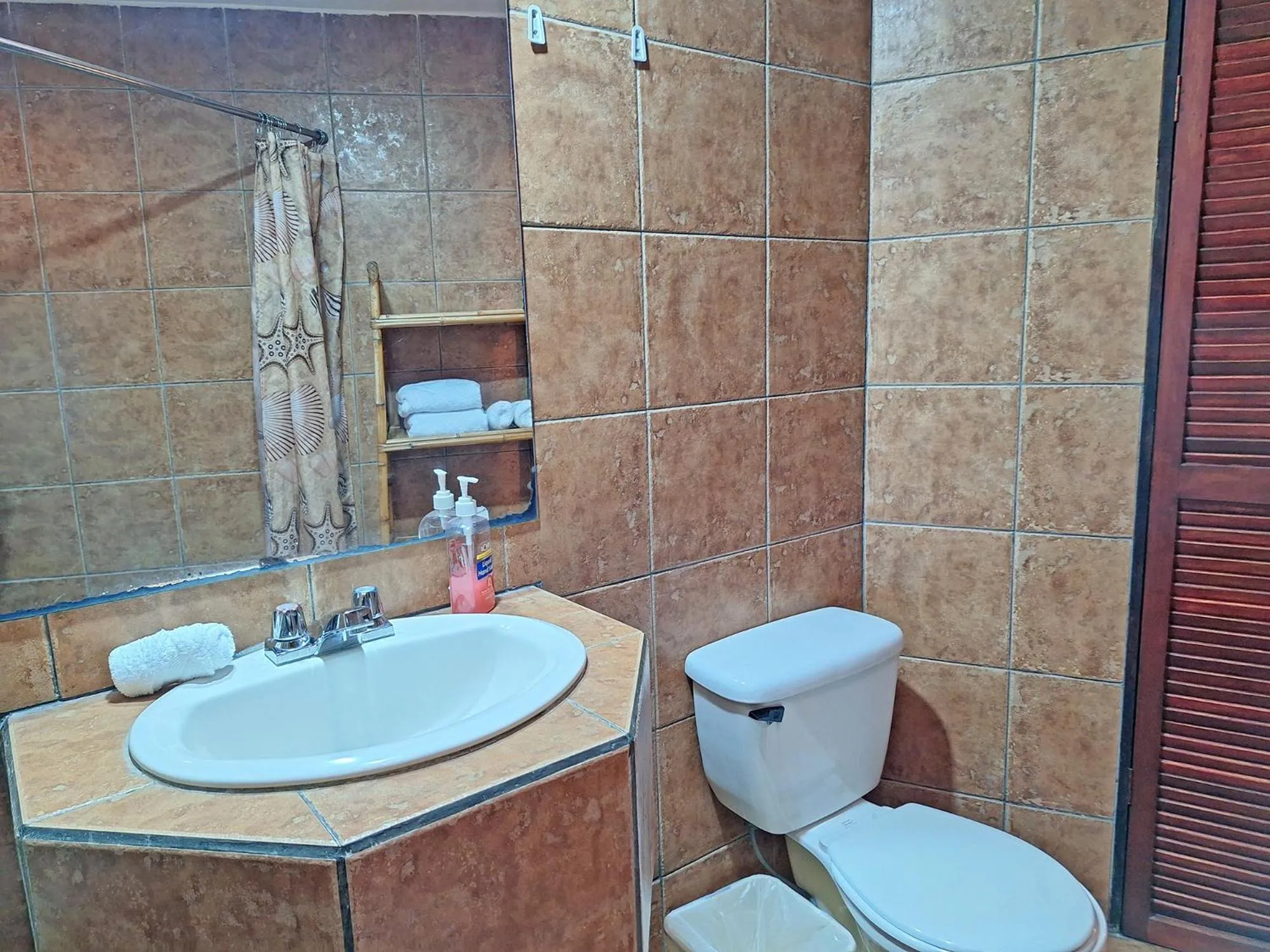 Bathroom in Colours Oasis Resort ADULT ONLY