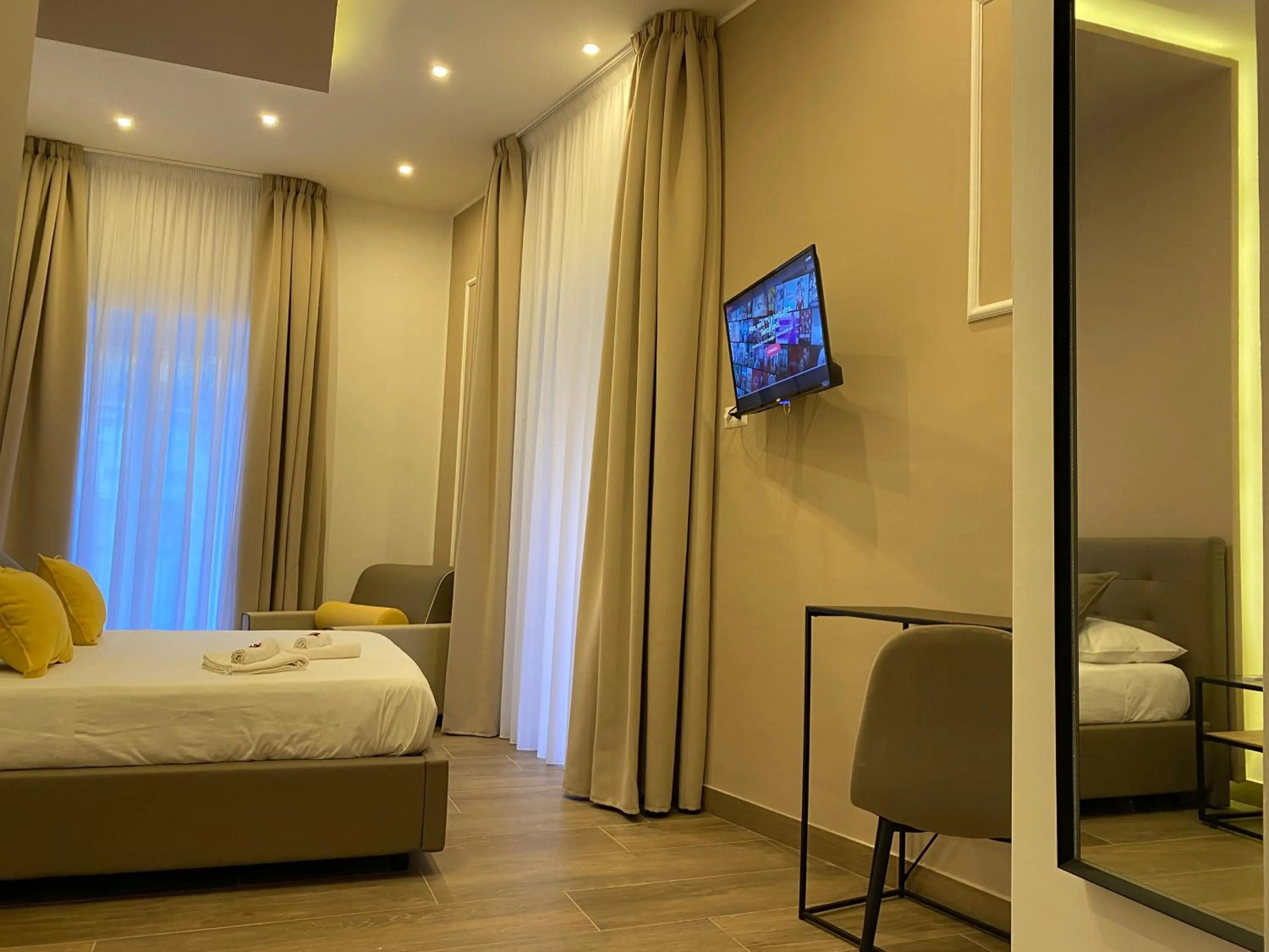 Photo of the whole room, Bed in Salotto Toledo