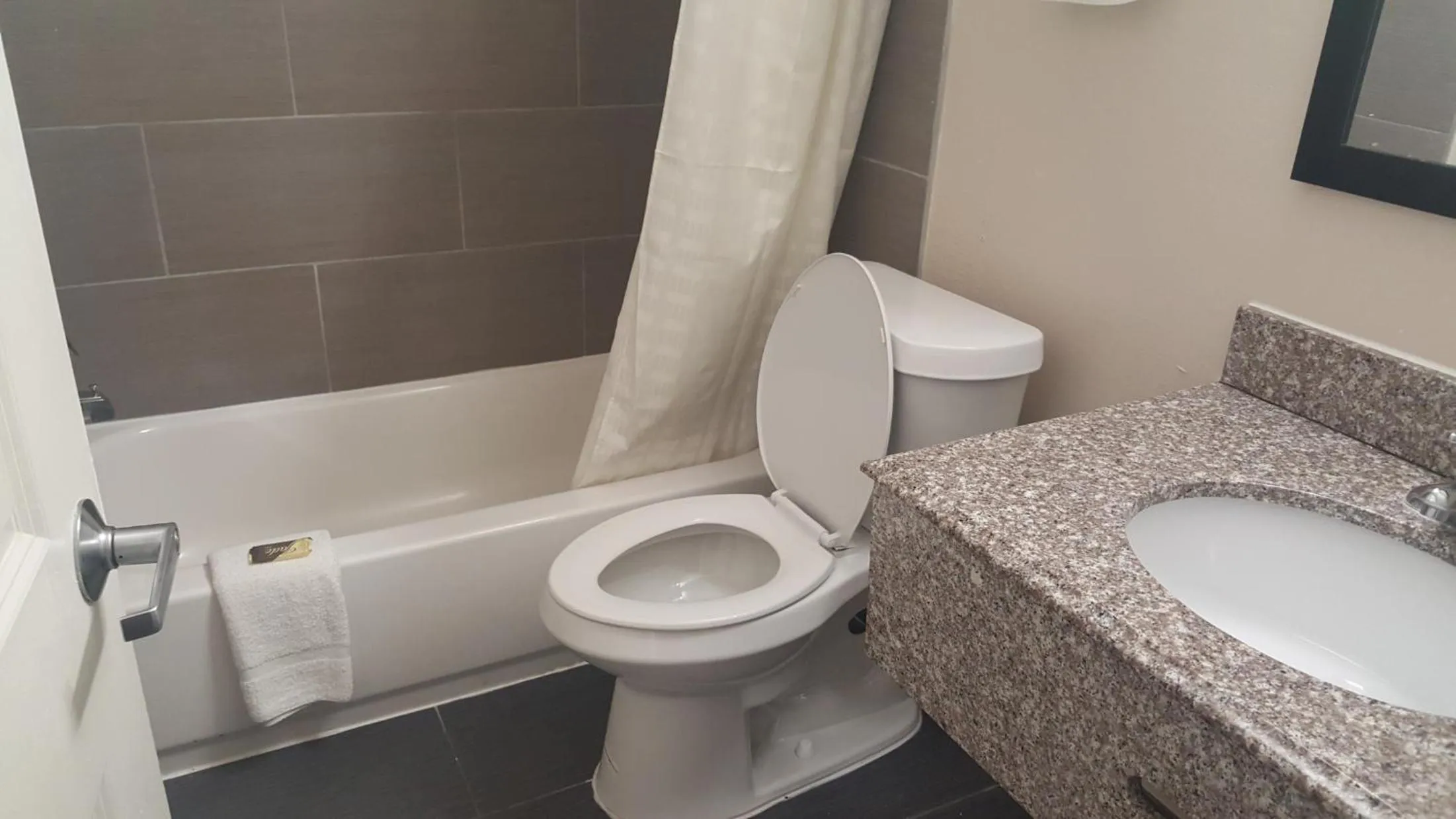 Bathroom in Baymont by Wyndham Pensacola