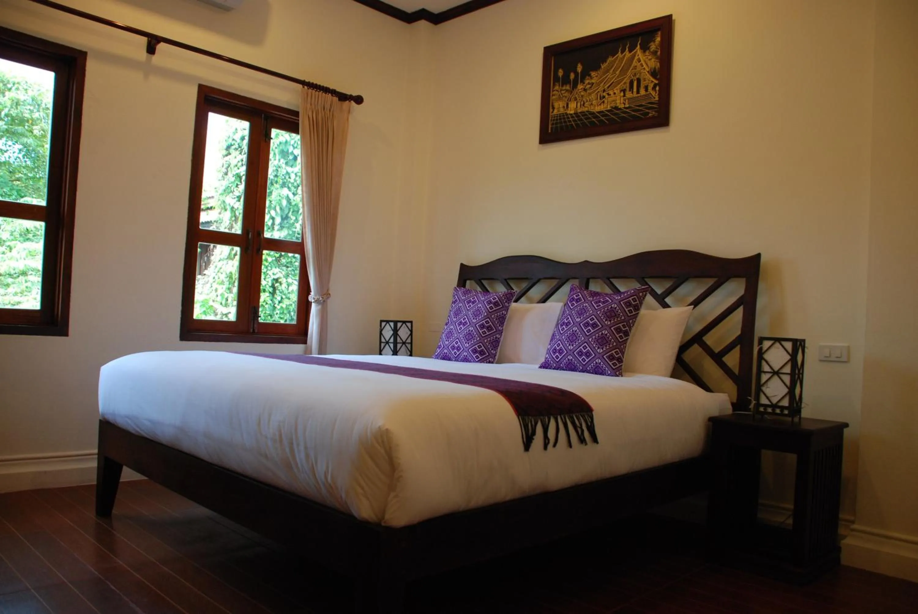 Bed in Luang Prabang Legend Hotel