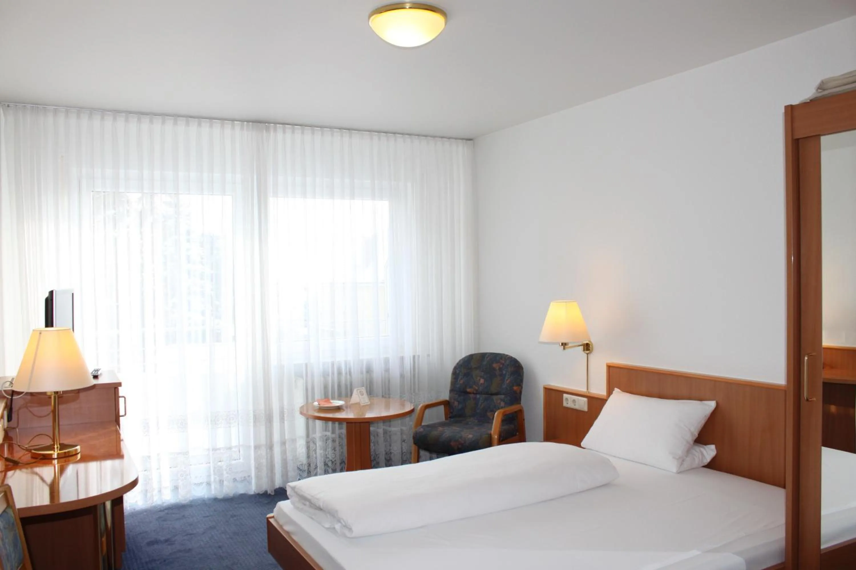 Photo of the whole room, Bed in Hotel Garni Eden