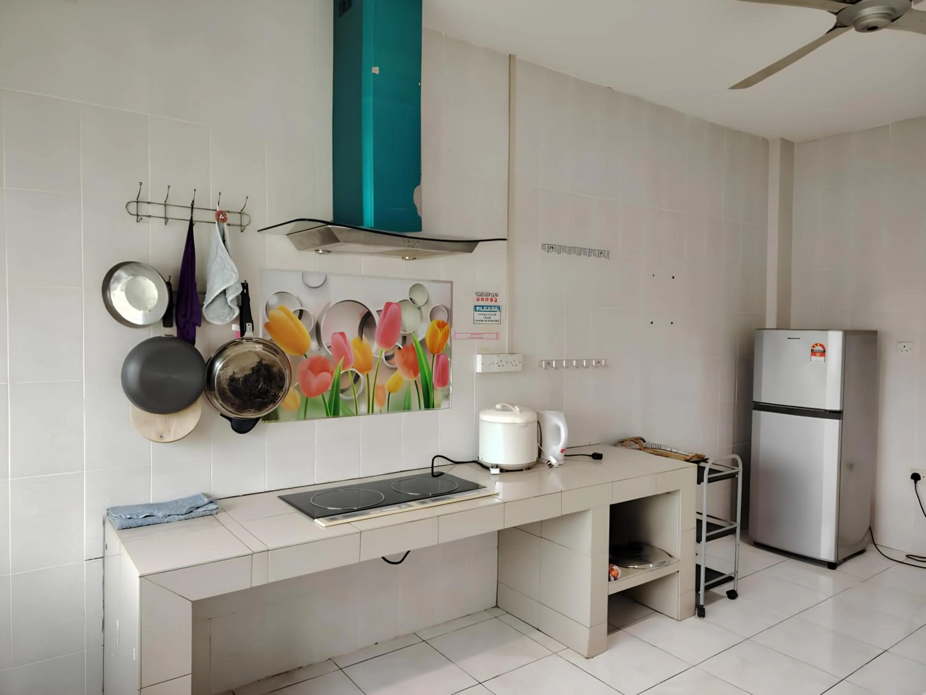 Kitchen or kitchenette in Natol Homestay - Kuching Home Penthouse Airport Road