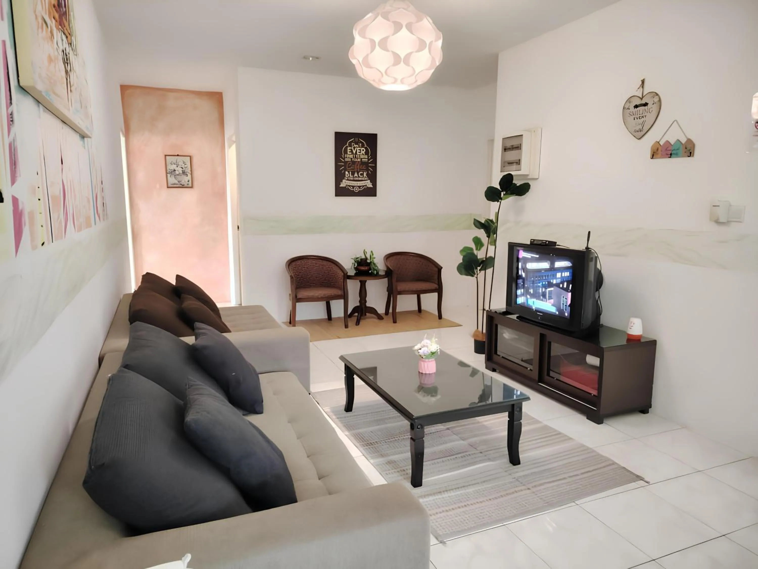 Living room in Natol Homestay - Kuching Home Penthouse Airport Road