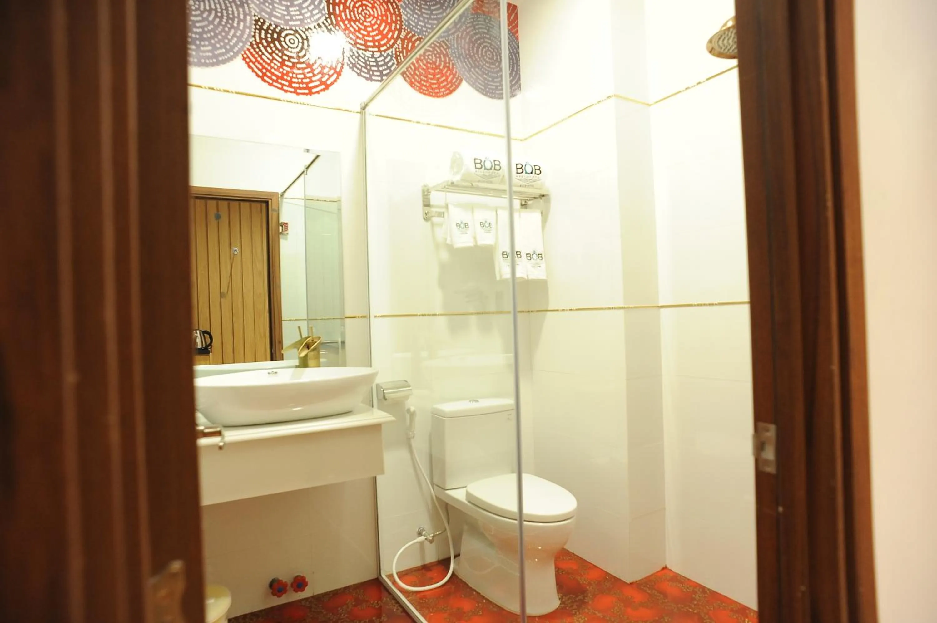 Toilet in B.O.B HOTEL SIGNATURE