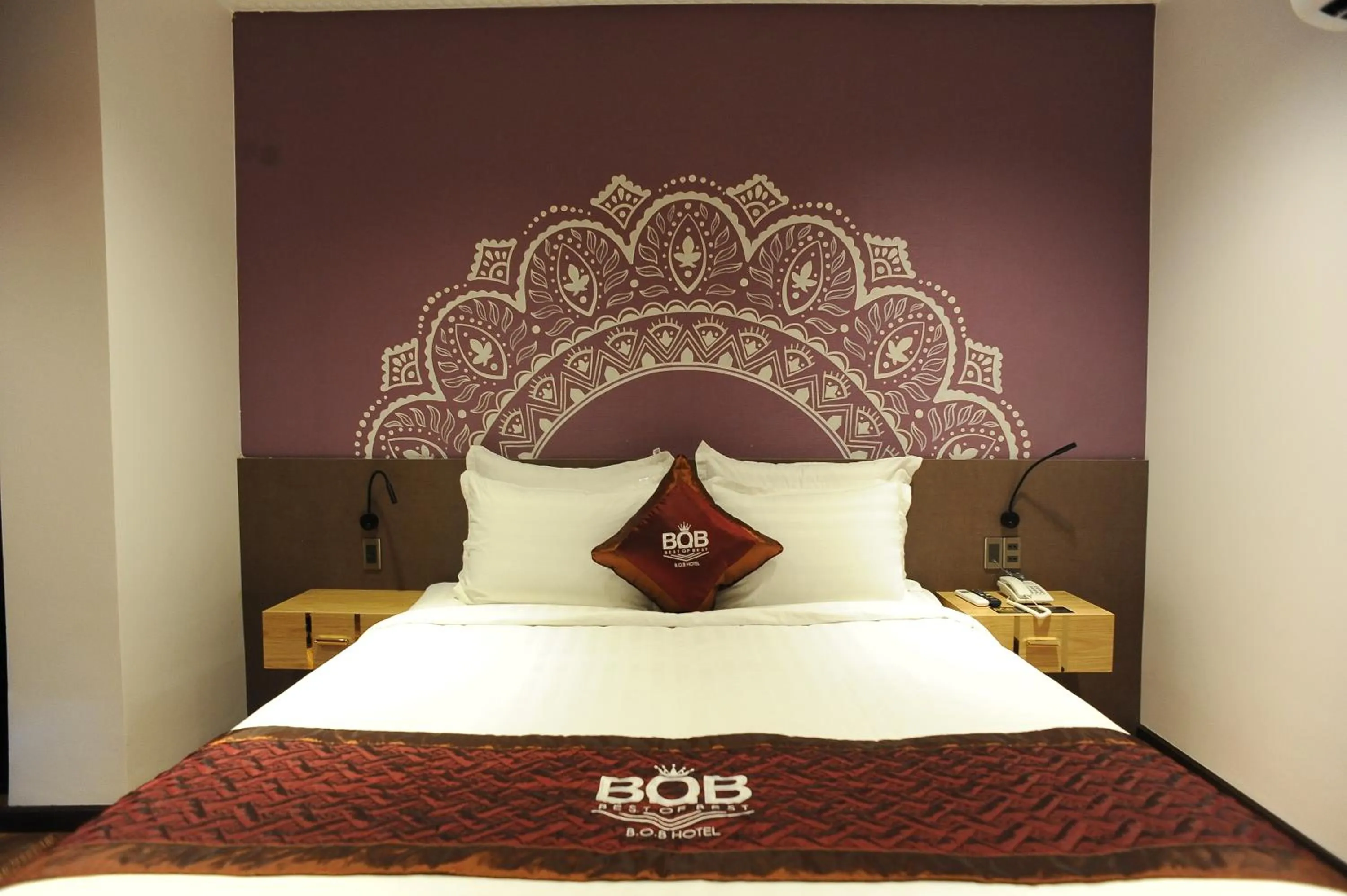 Bed in B.O.B HOTEL SIGNATURE