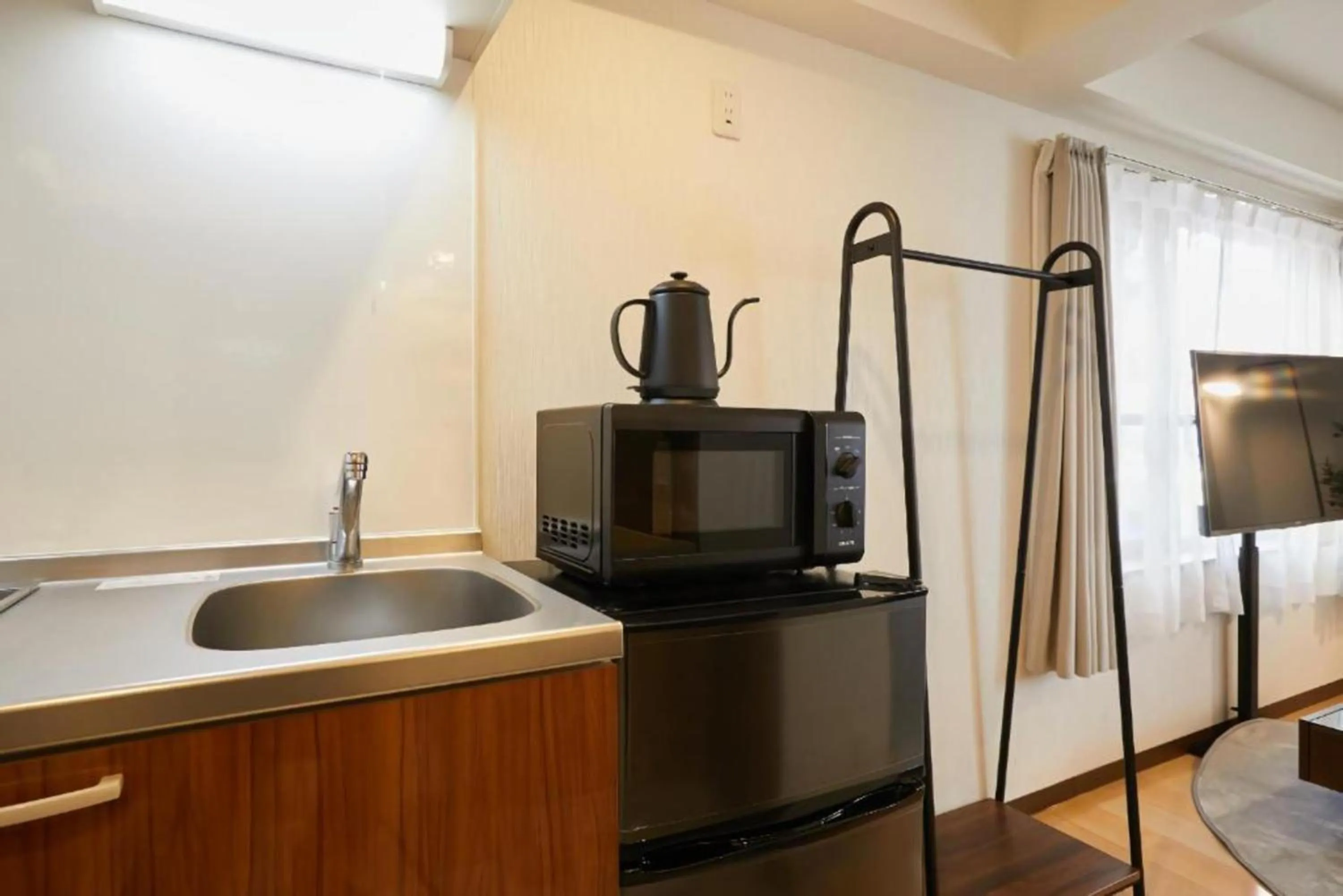 Kitchen or kitchenette in HOTEL AIS HATAGAYA