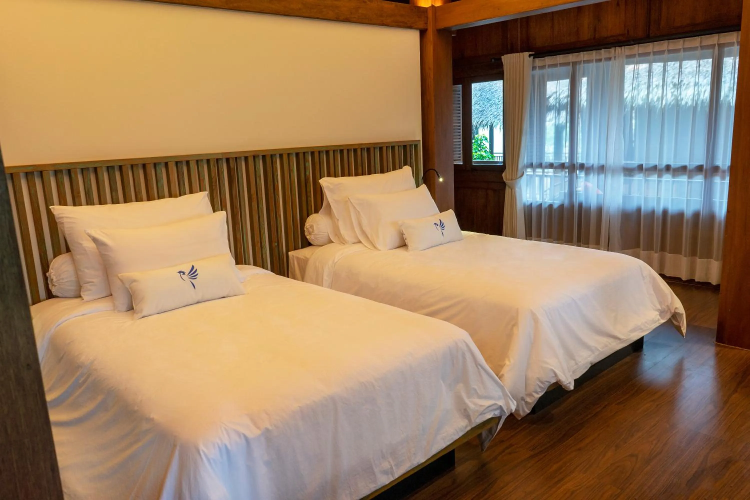 Bed in Tira Vilagna Suites & Spa