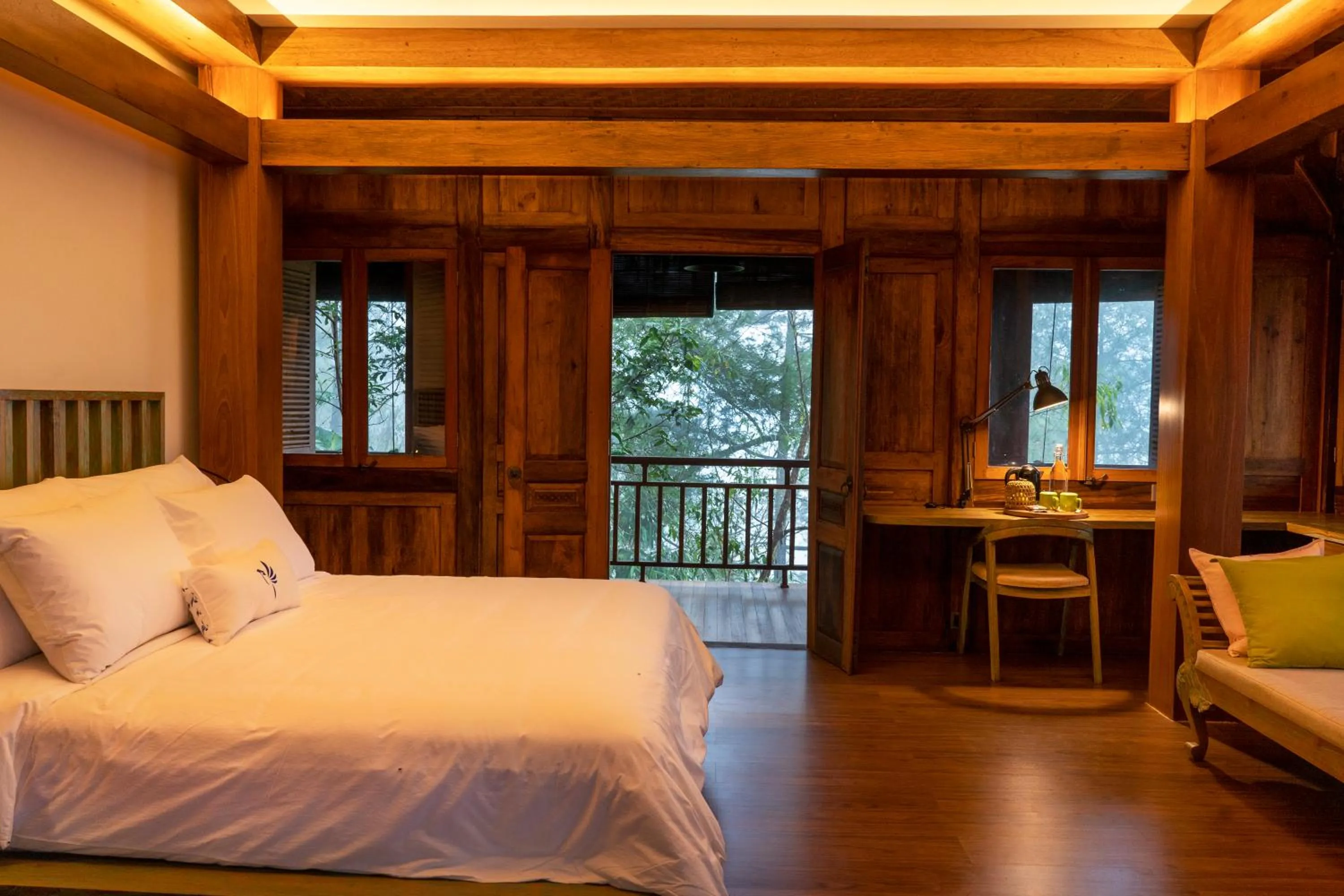 Bed in Tira Vilagna Suites & Spa