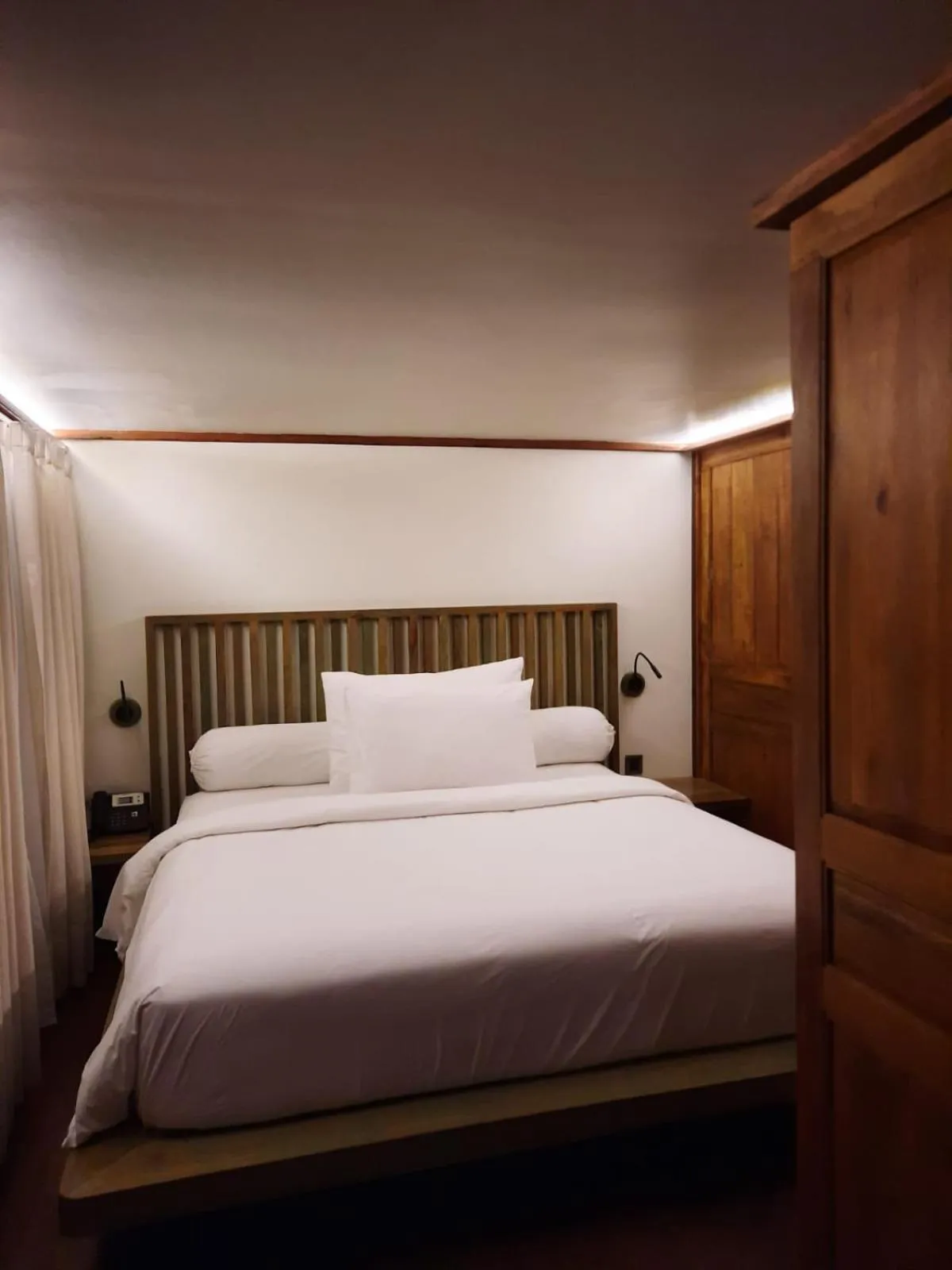 Bed in Tira Vilagna Suites & Spa