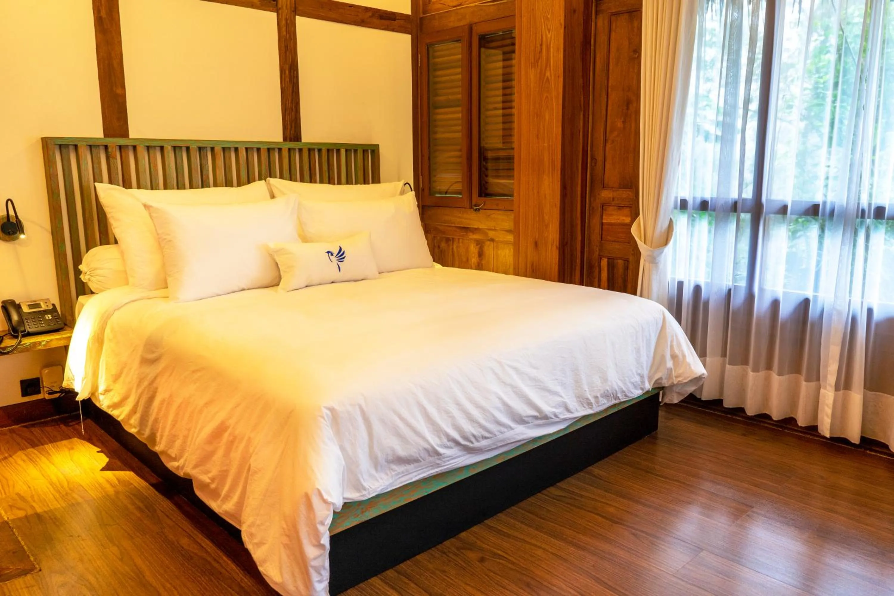 Bed in Tira Vilagna Suites & Spa