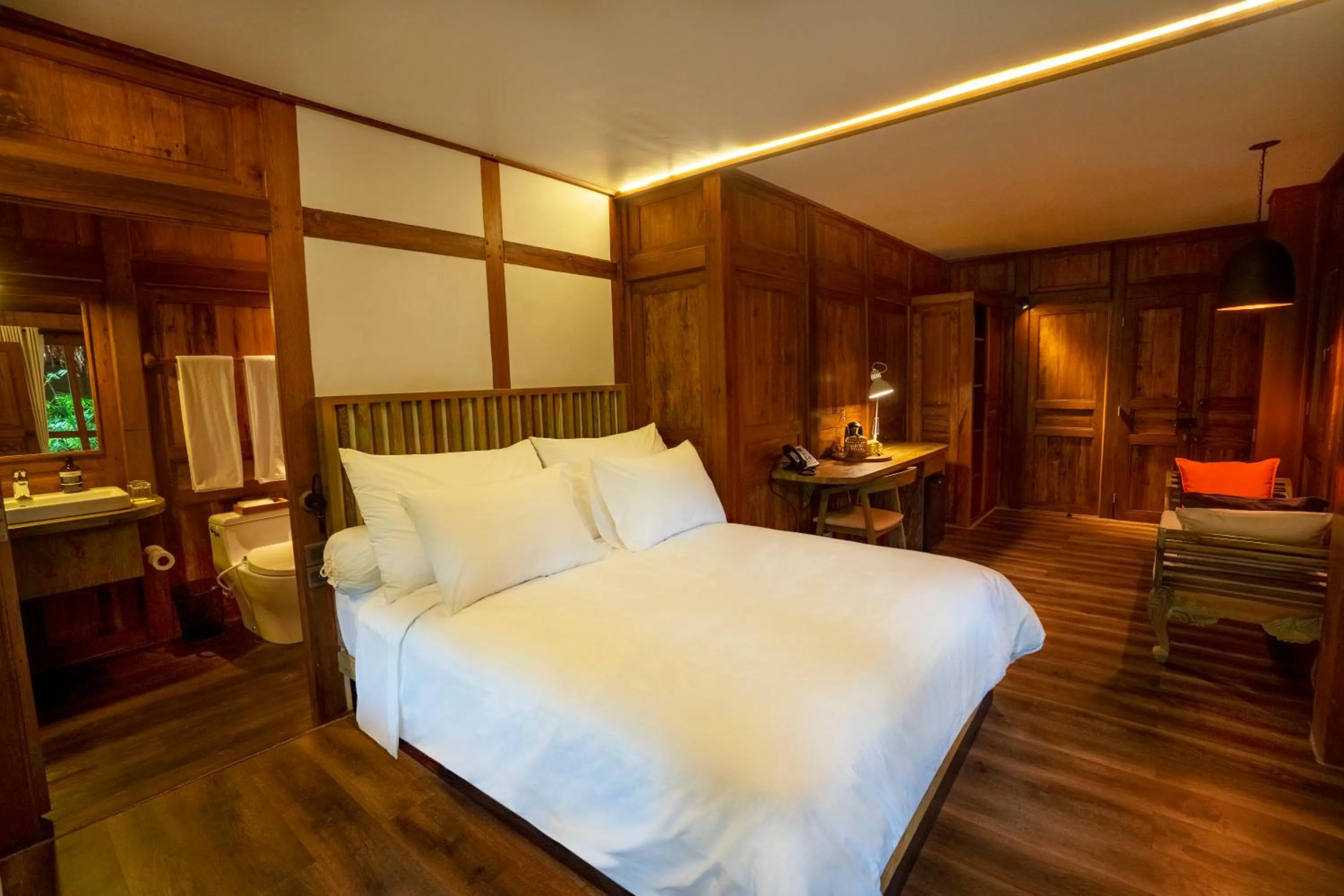 Bed in Tira Vilagna Suites & Spa