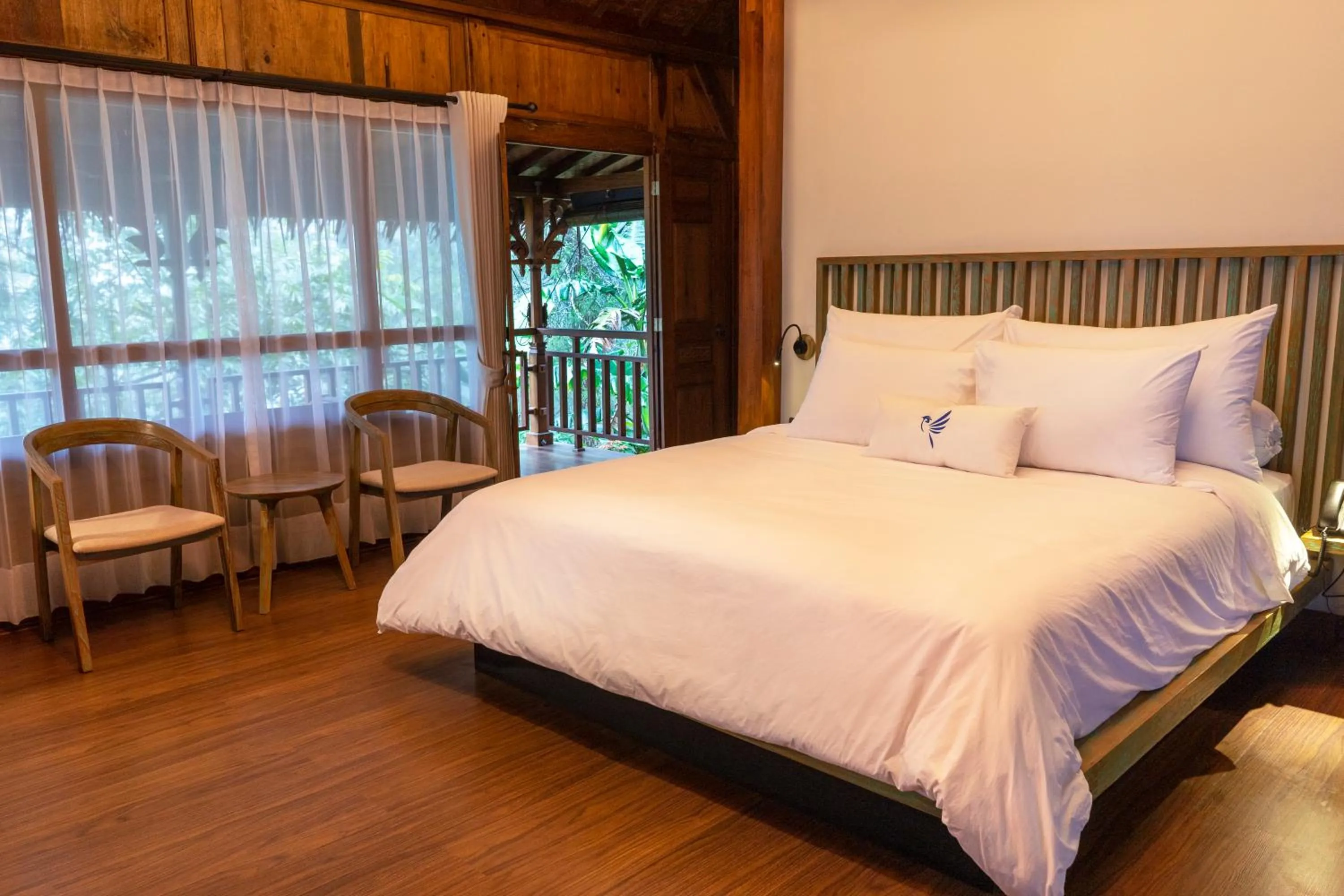 Bed in Tira Vilagna Suites & Spa