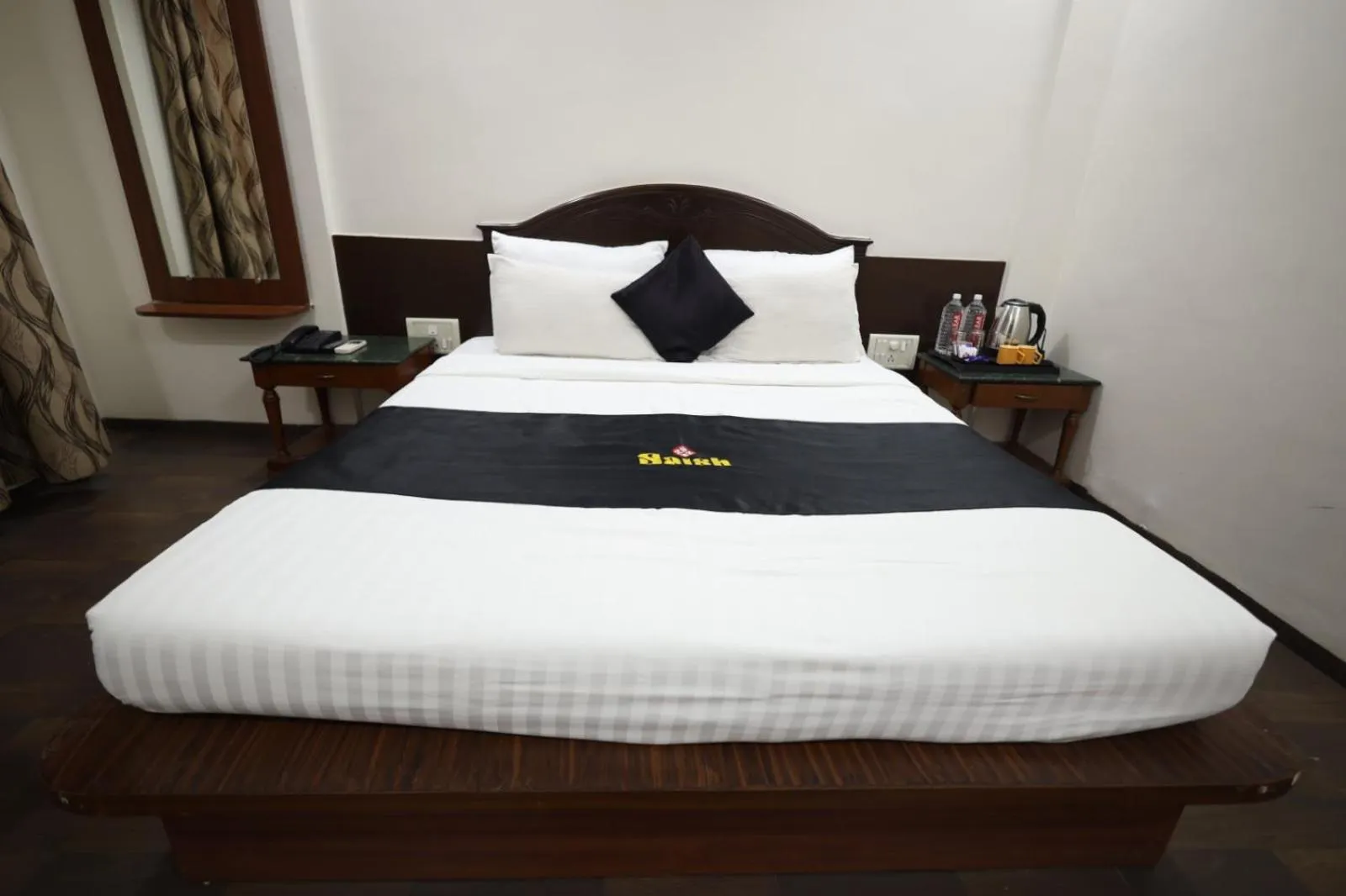 Photo of the whole room, Bed in Saish Hotel Shirdi