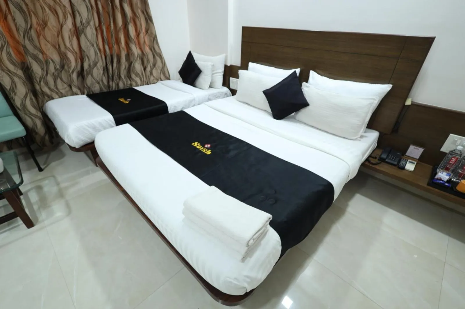 Bedroom, Bed in Saish Hotel Shirdi