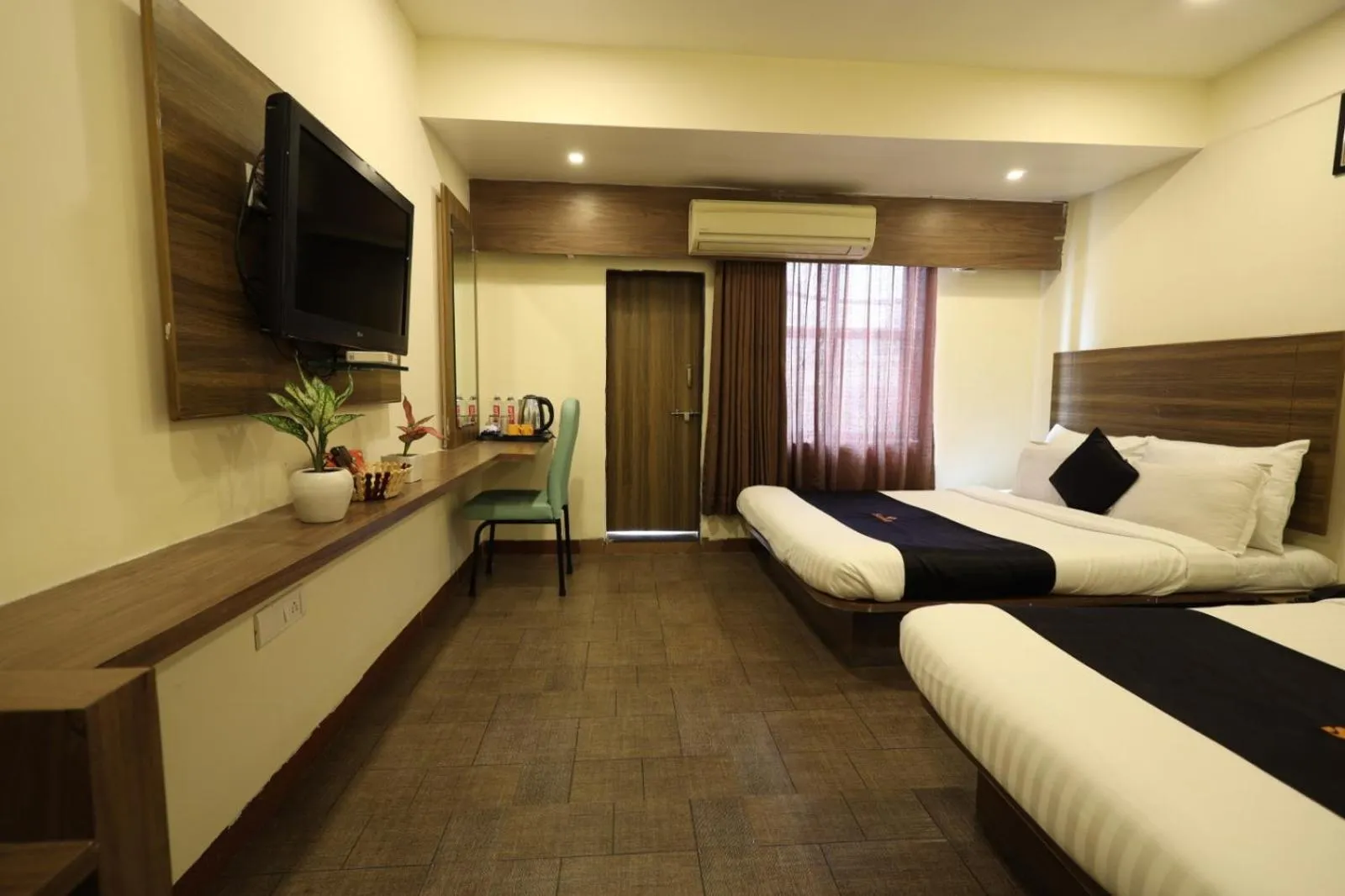 Property building, Bed in Saish Hotel Shirdi