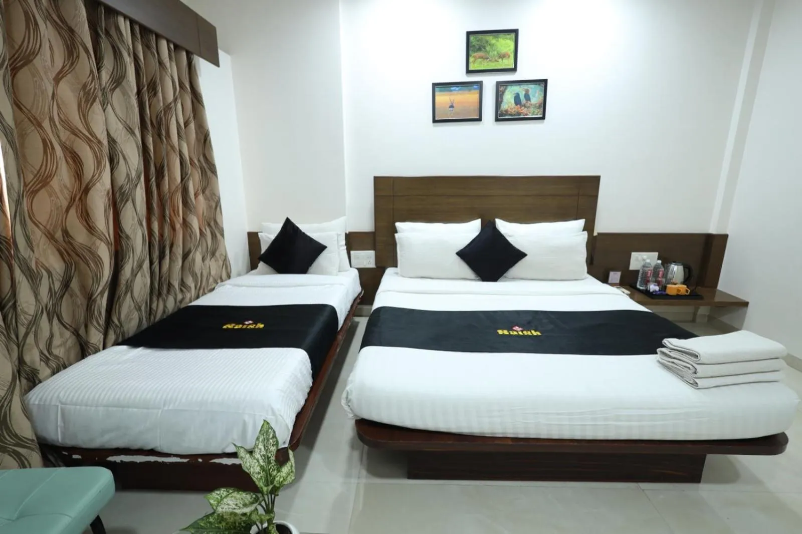 Bedroom, Bed in Saish Hotel Shirdi