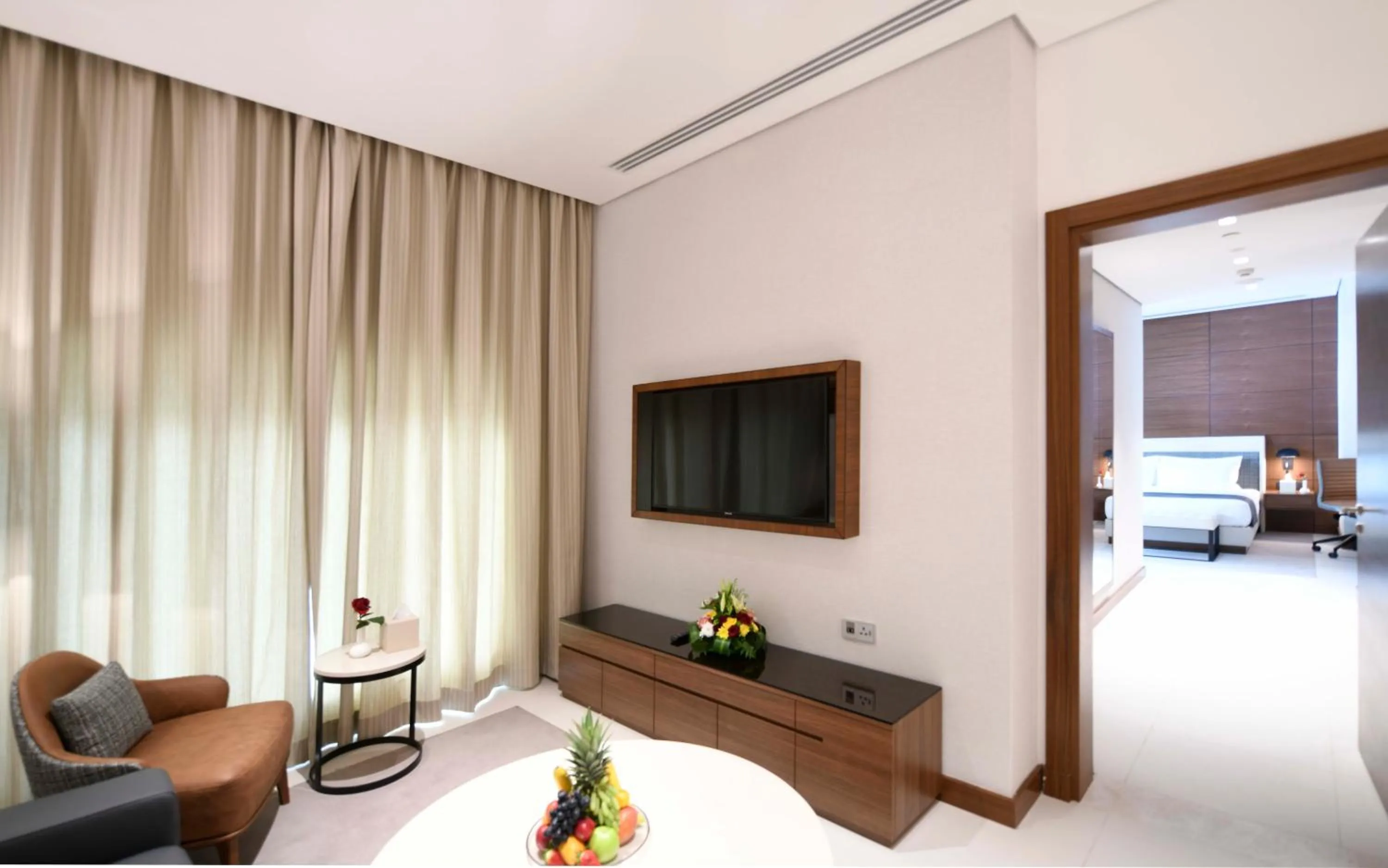 Seating area, Bed in Golden Tulip Riyadh Convention and Exhibition Center