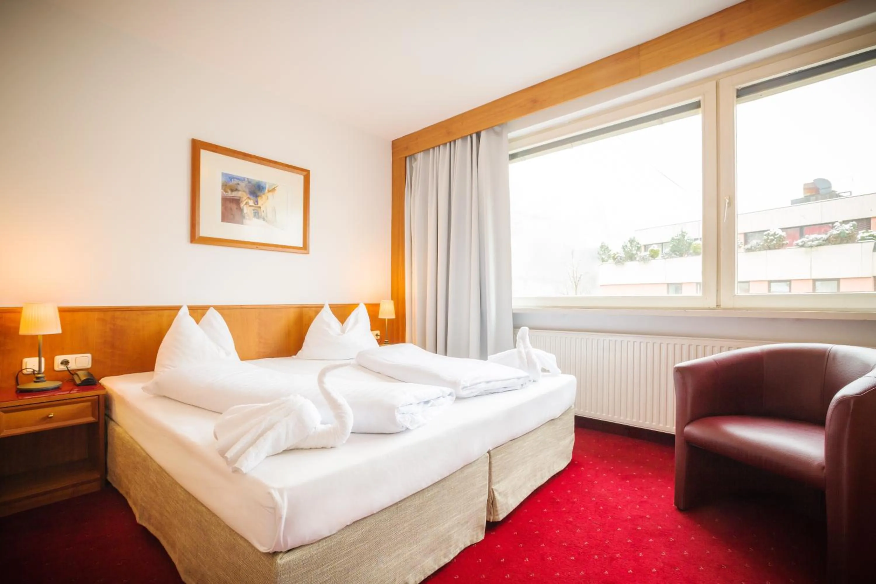 Photo of the whole room, Bed in Am Neutor Hotel Salzburg Zentrum