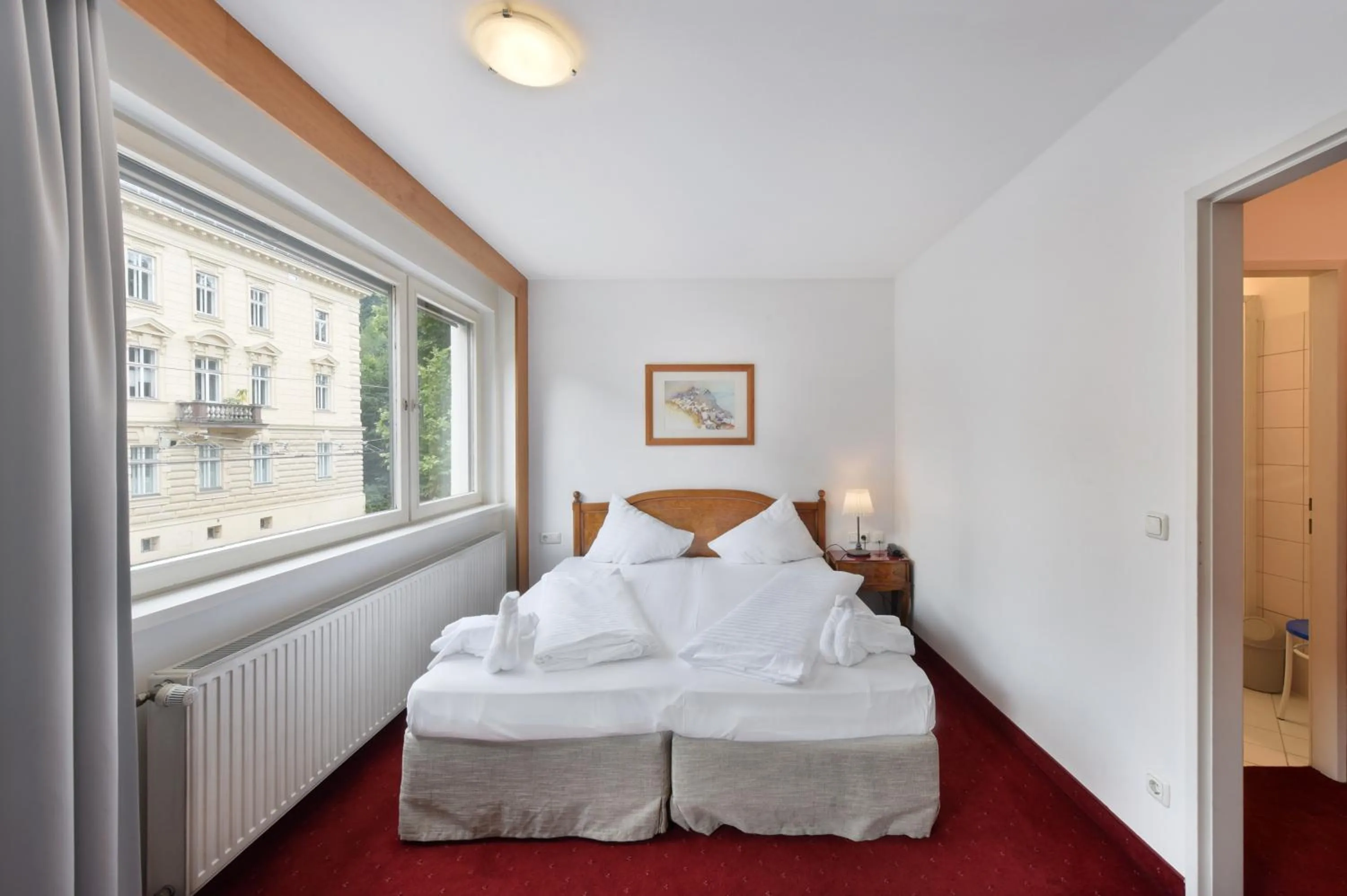 Photo of the whole room, Bed in Am Neutor Hotel Salzburg Zentrum