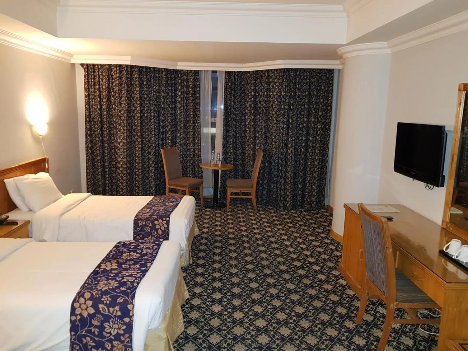 Communal lounge/ TV room, Bed in Phoenicia Tower Hotel And Spa