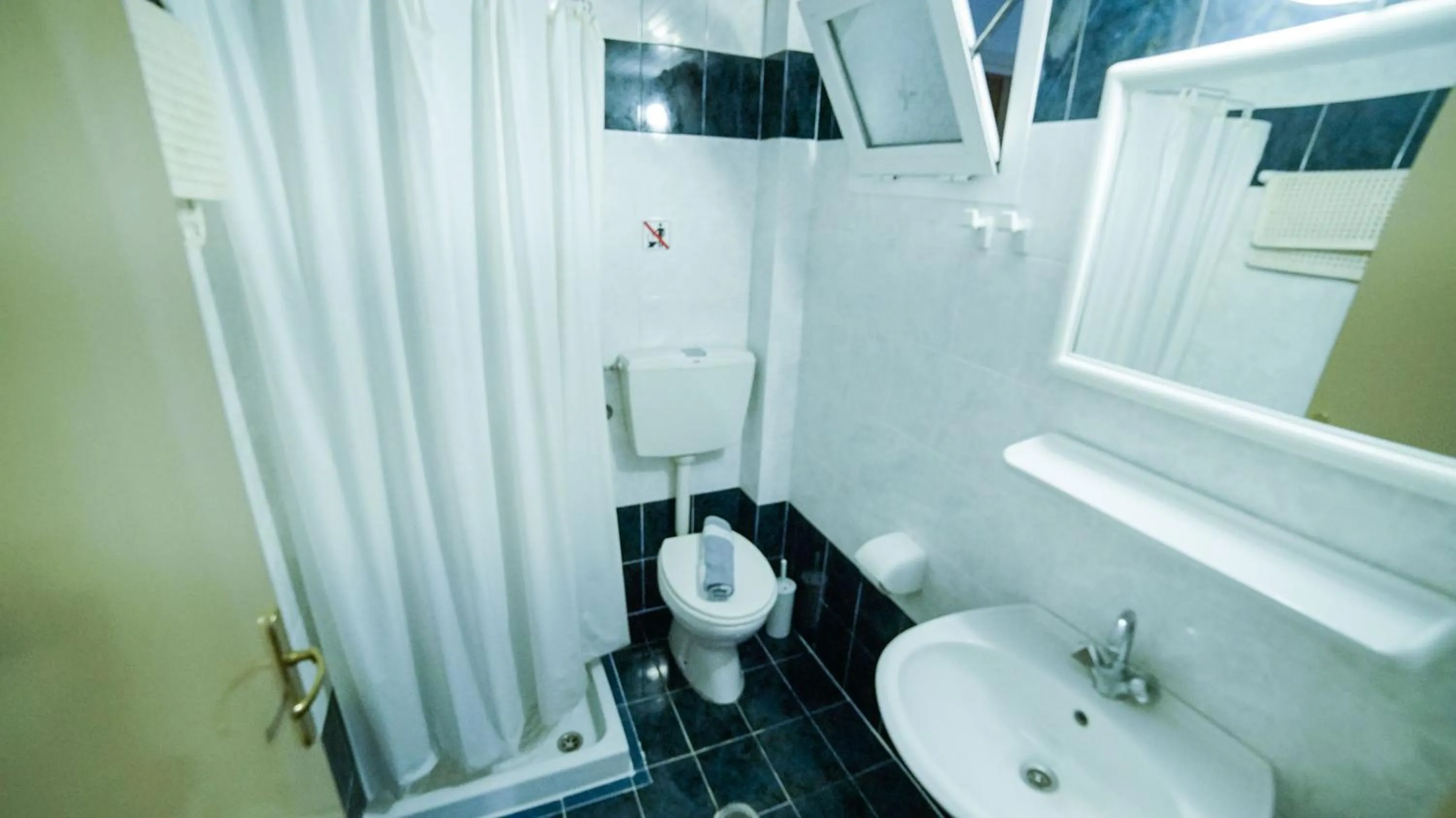 Bathroom in Yiannis Manos Hotel Resort