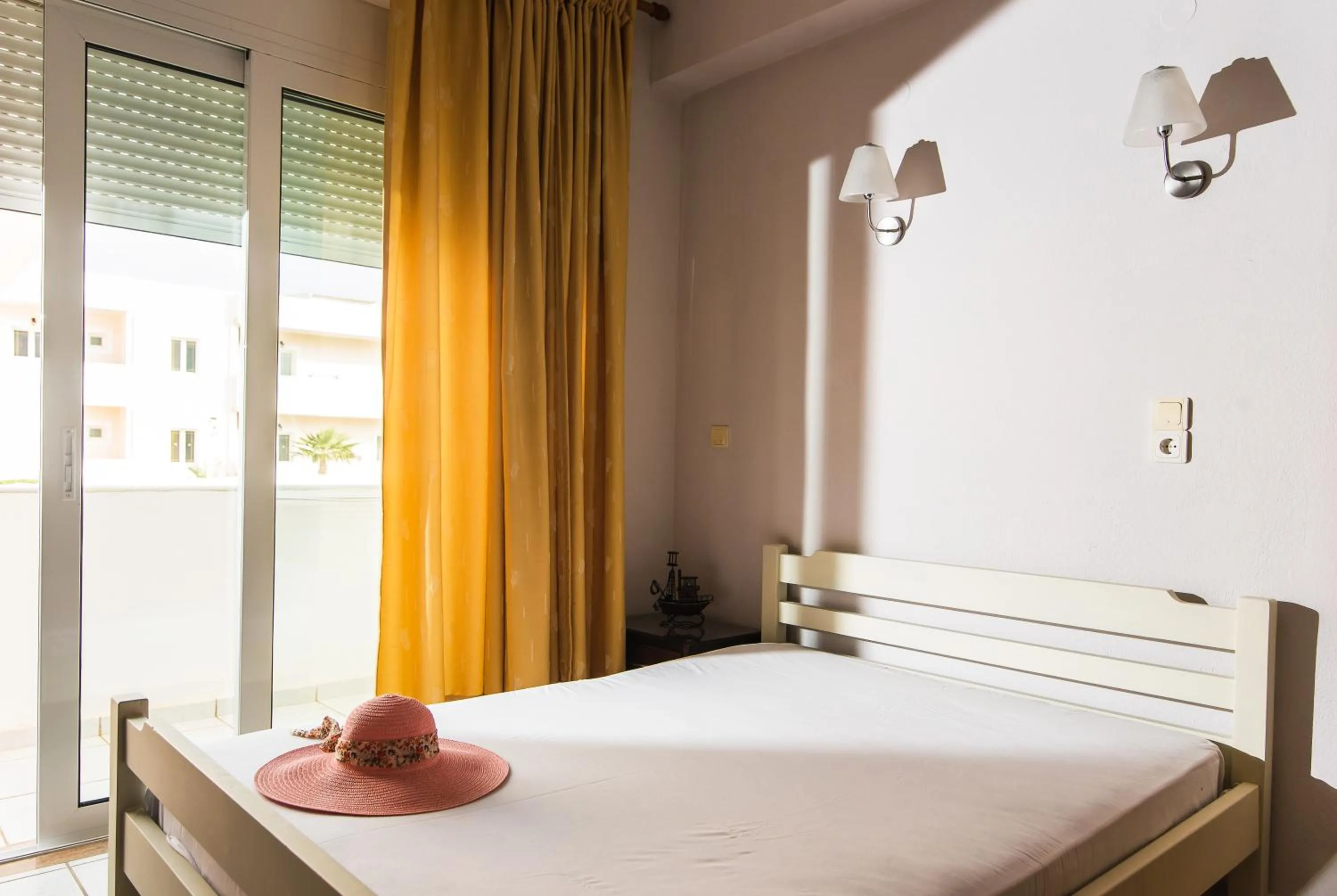 Bedroom, Bed in Yiannis Manos Hotel Resort