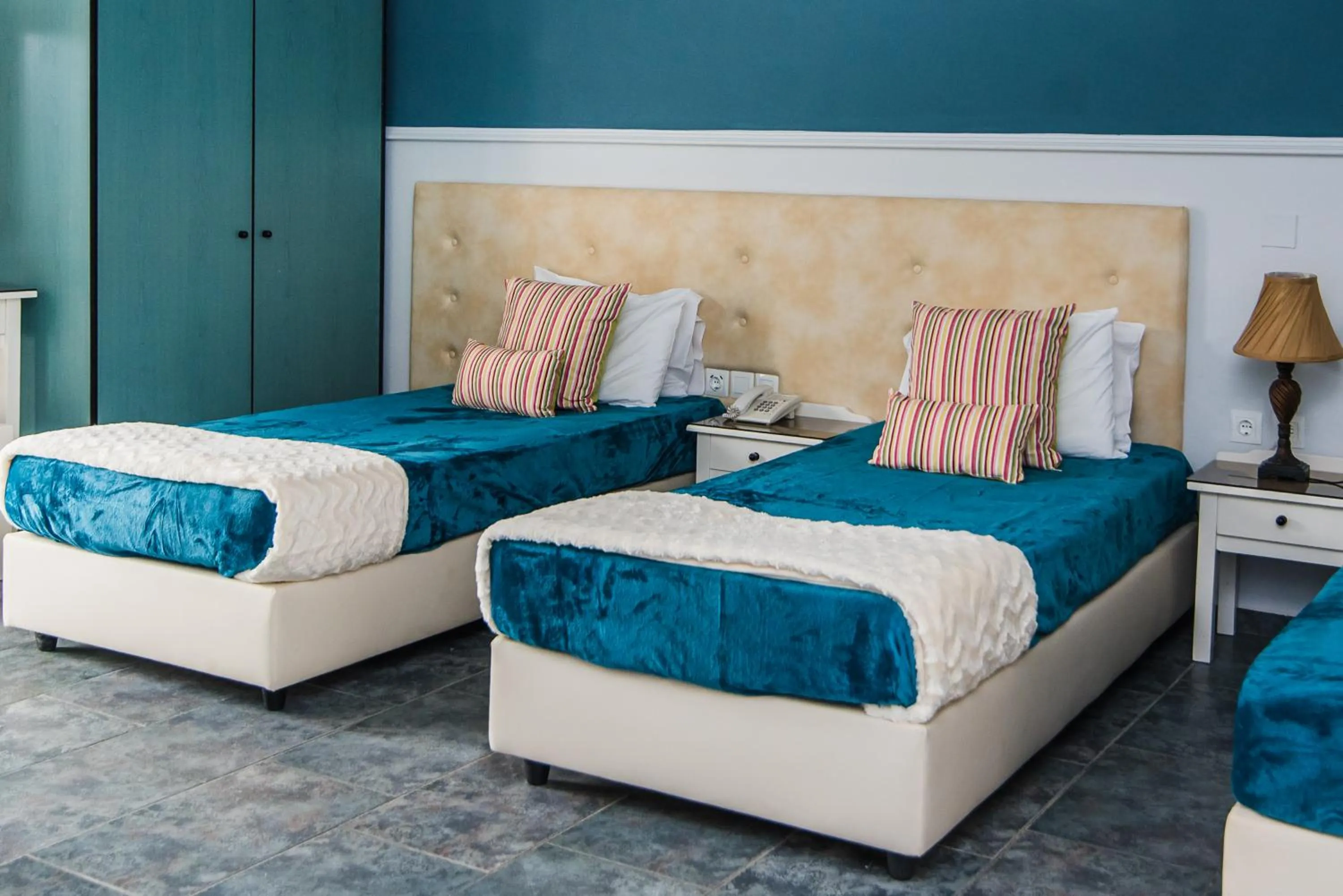 Bed in Yiannis Manos Hotel Resort