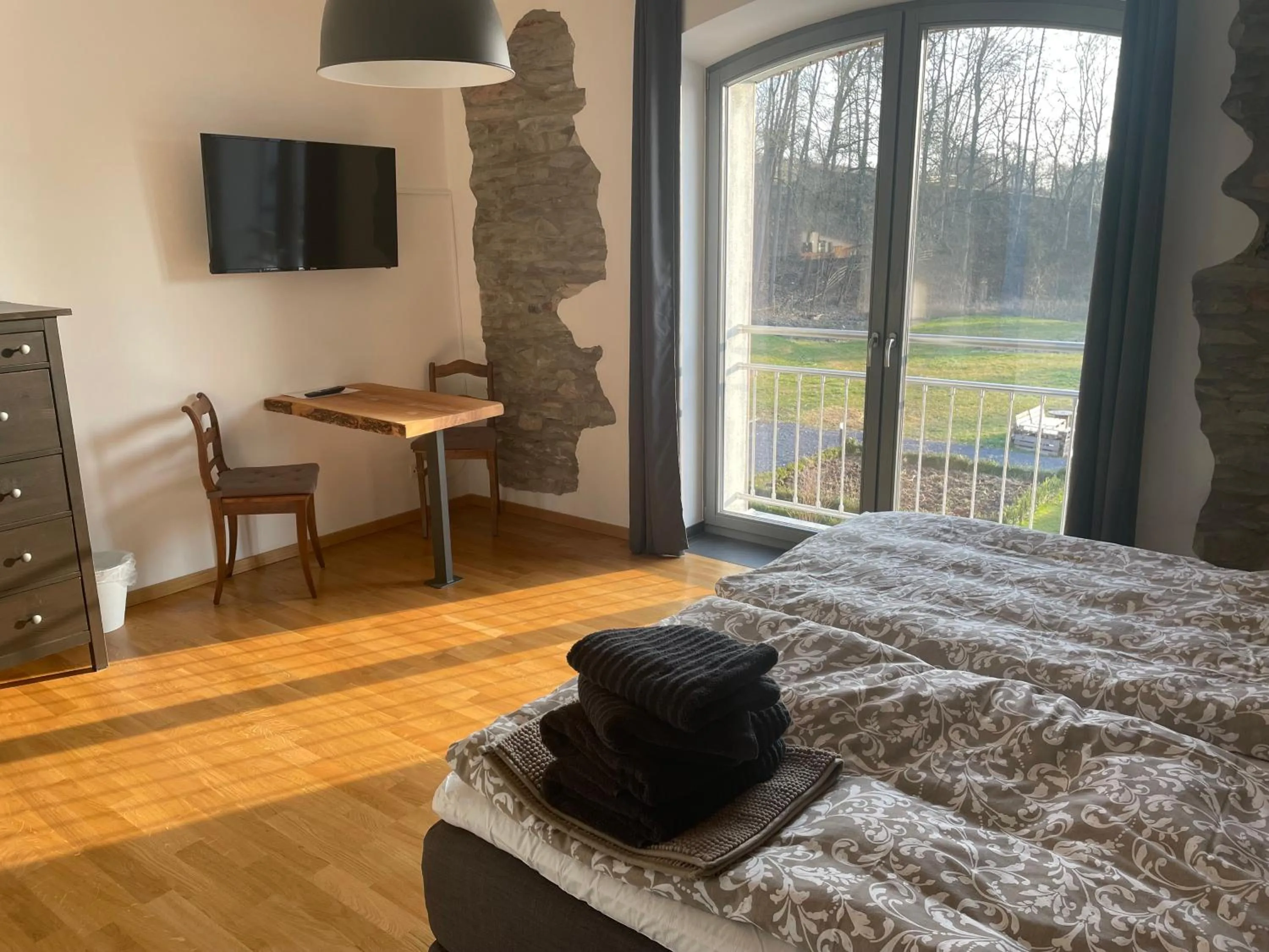 Bed in Gästehaus Lausnitz Zimmer