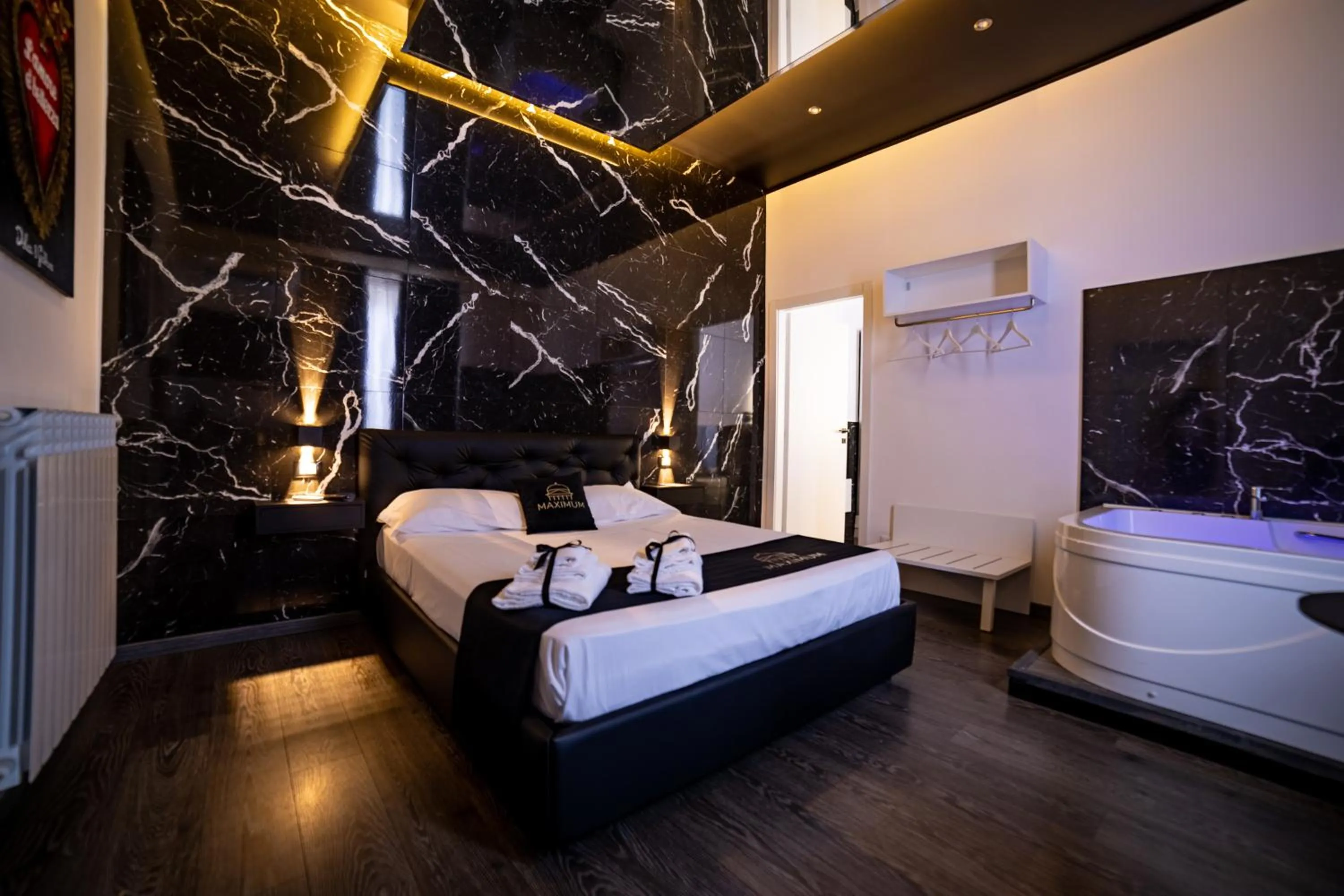 Bed in Maximum Suite & Spa