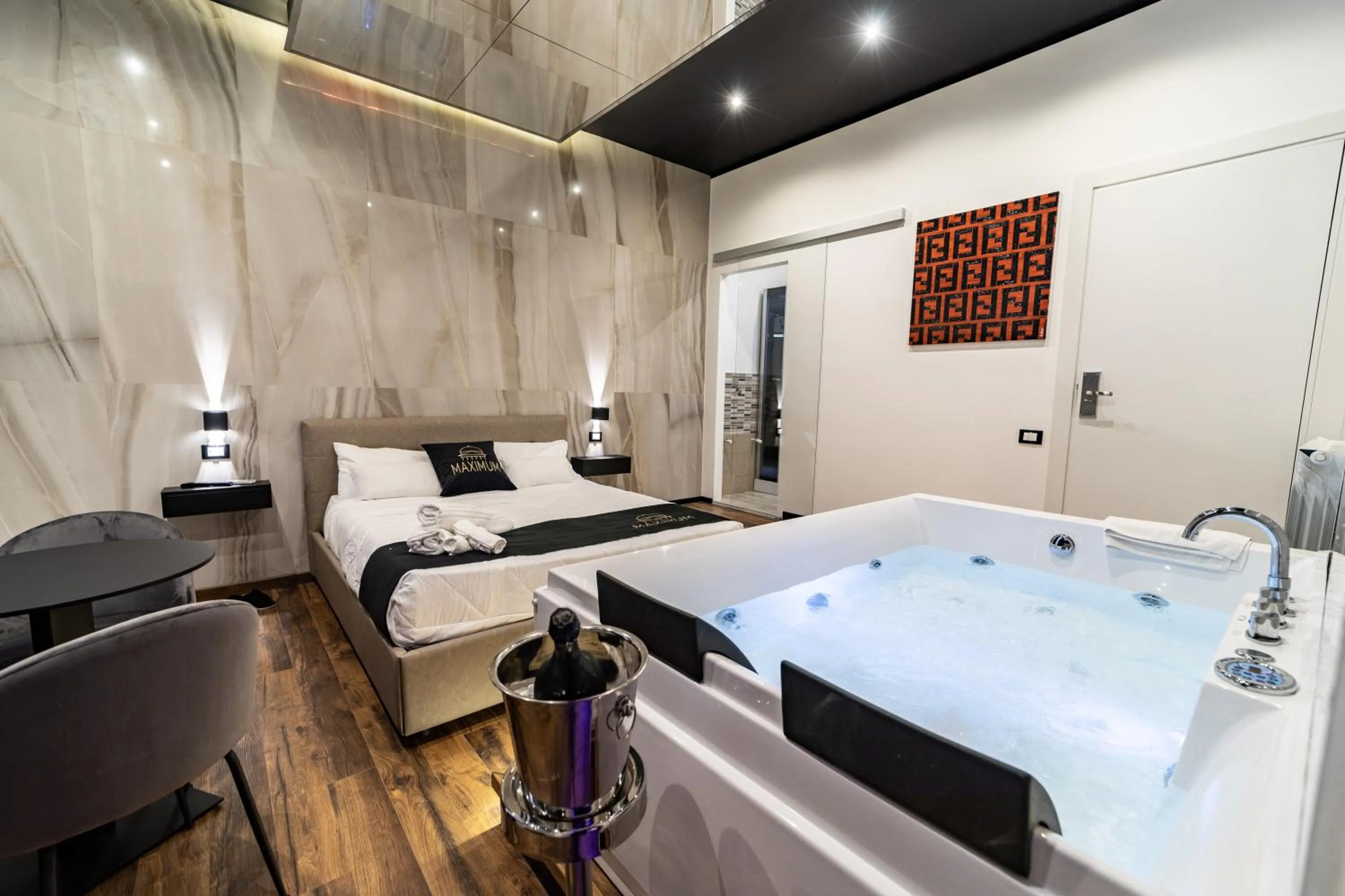 Bed in Maximum Suite & Spa