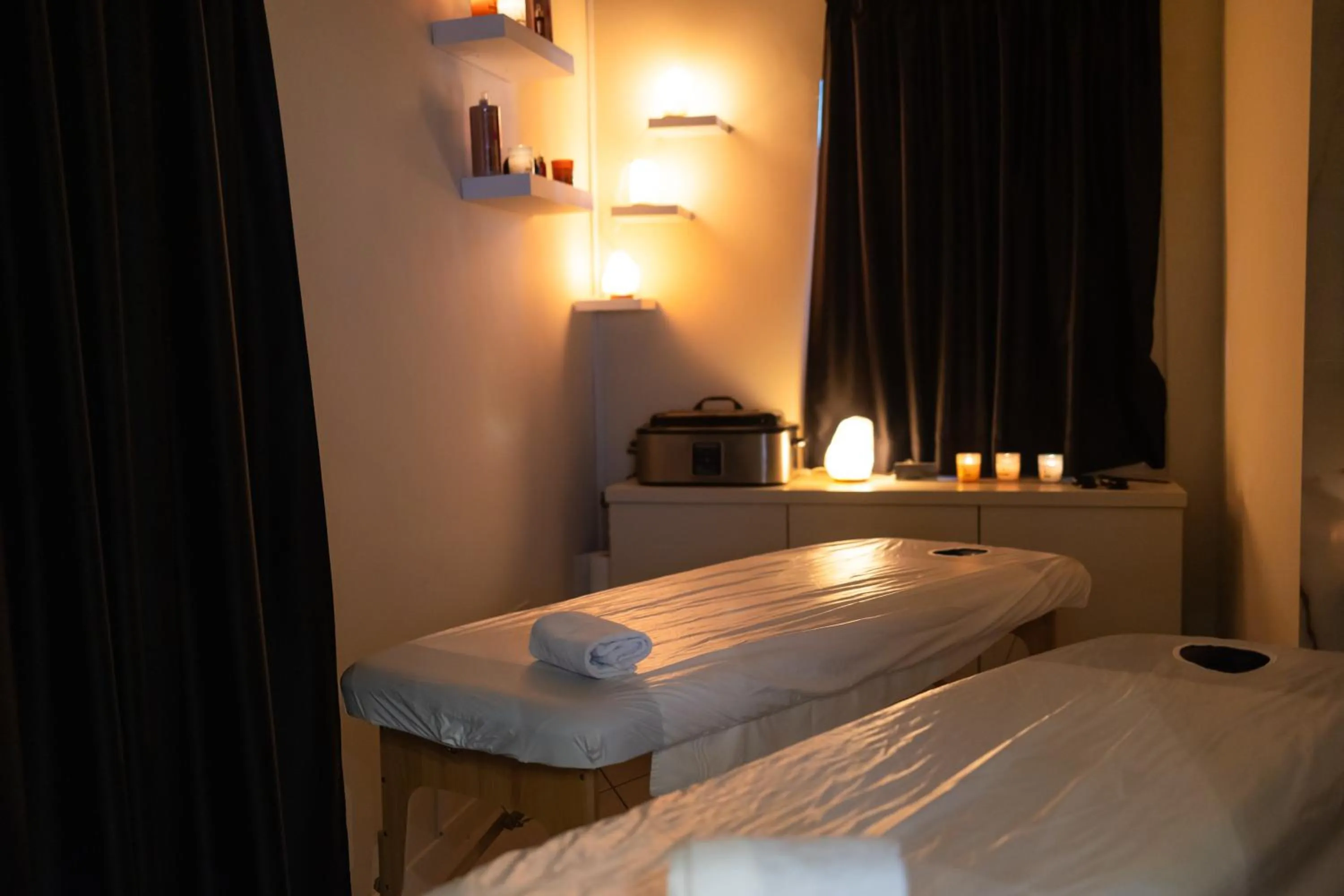 Bed in Maximum Suite & Spa