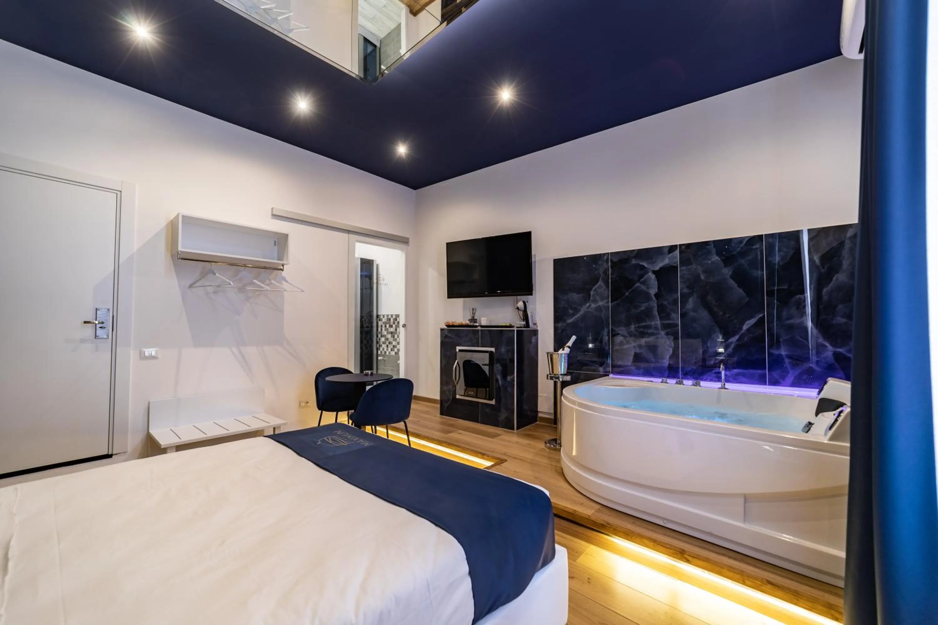 Bed in Maximum Suite & Spa