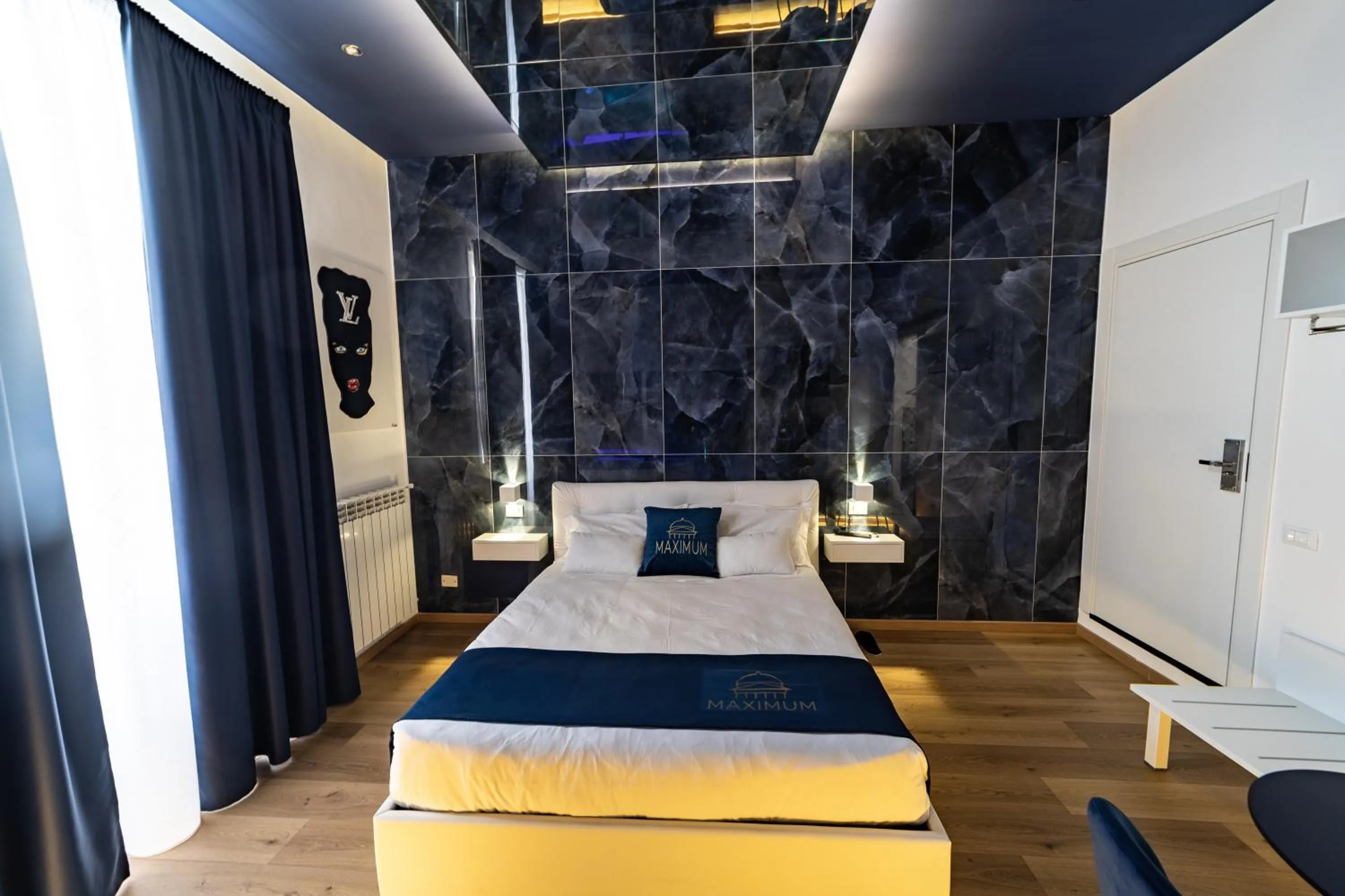 Bed in Maximum Suite & Spa