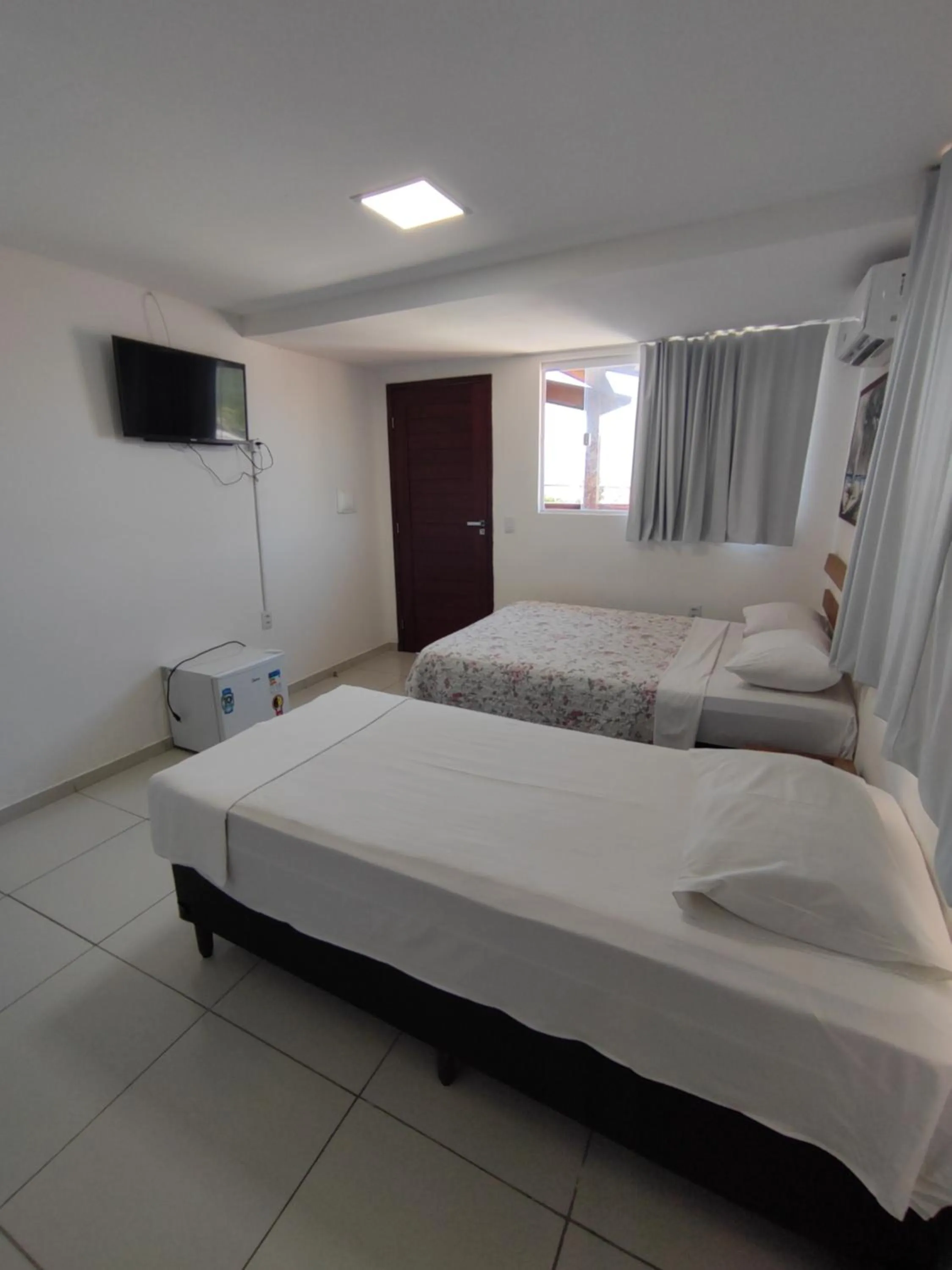 Bed in Encanto da Praia hotel pousada